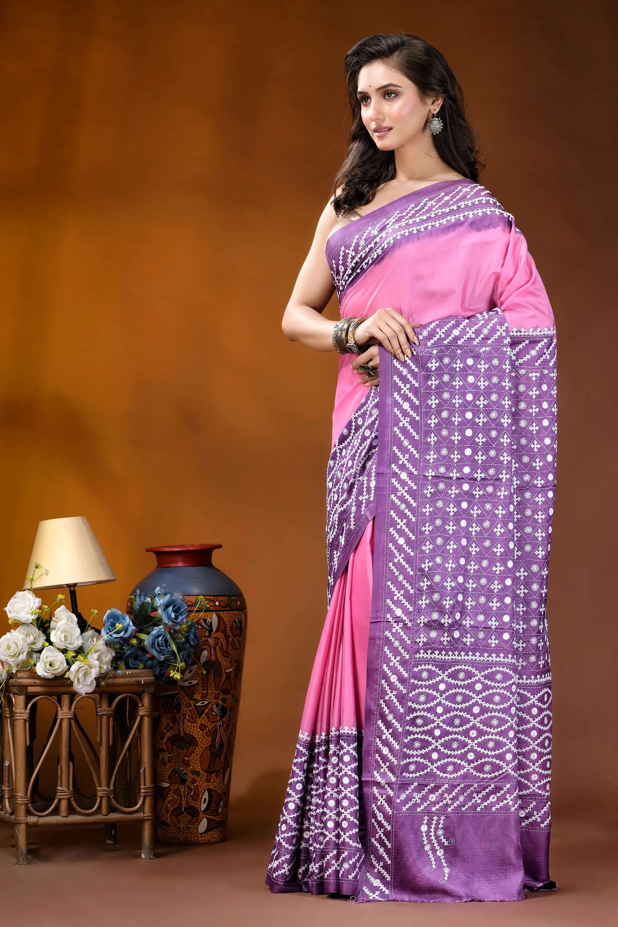 Magenta pink ethnic design kutch embroidered dyed silk saree with mirror work woman wears vibrant pink purple 3