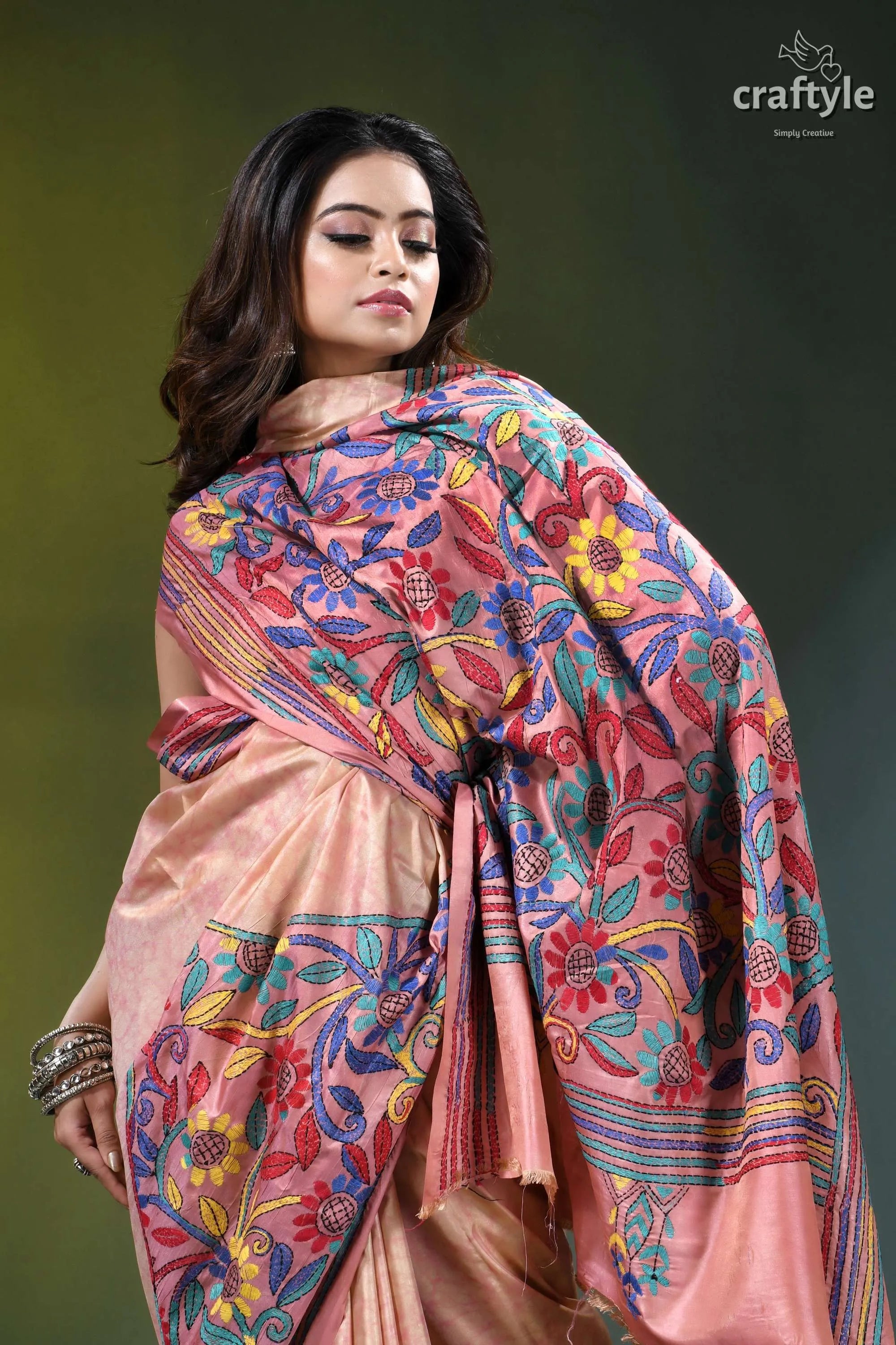 Mandys pink floral design hand kantha stitch batik silk saree woman wears peach-colored silk saree 5