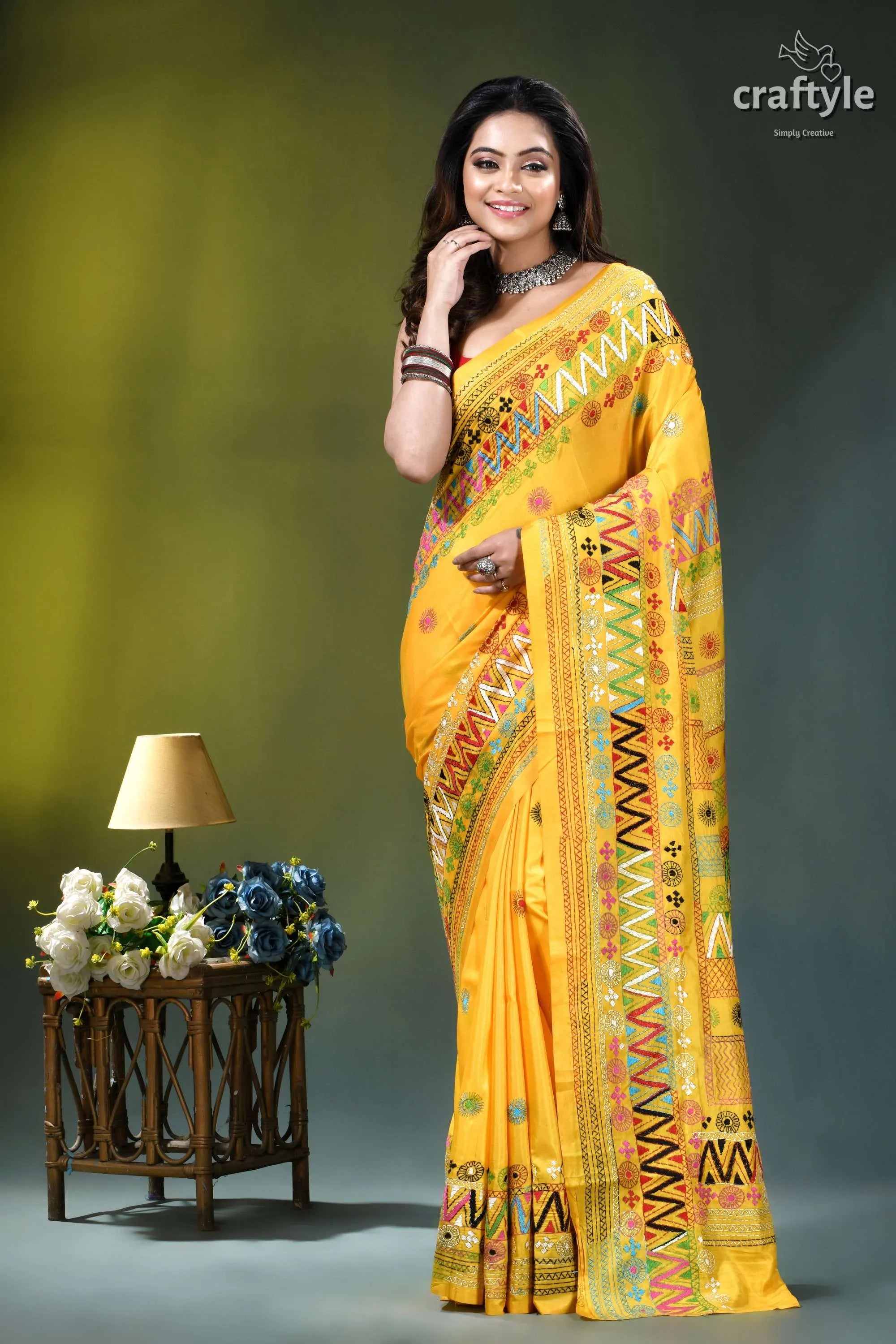 Marigold yellow hand embroidered floral design silk lambani saree vibrant yellow saree intricate multicolored 6