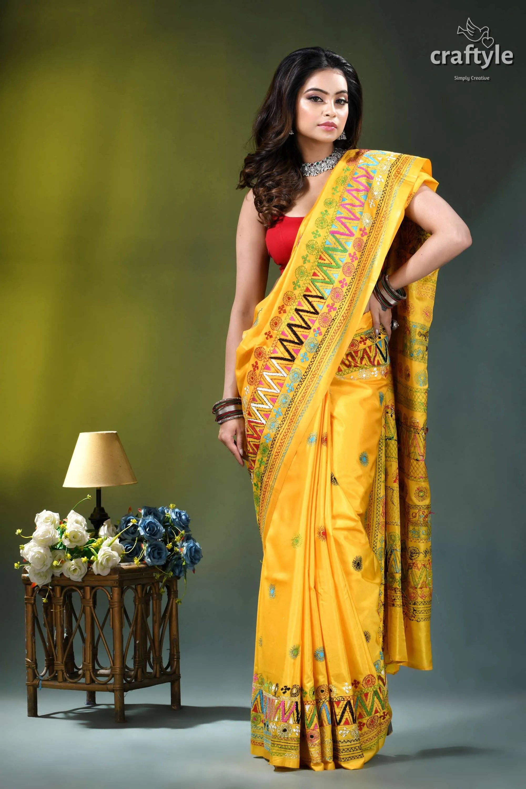 Marigold yellow hand embroidered floral design silk lambani saree vibrant yellow saree intricate multicolored 7