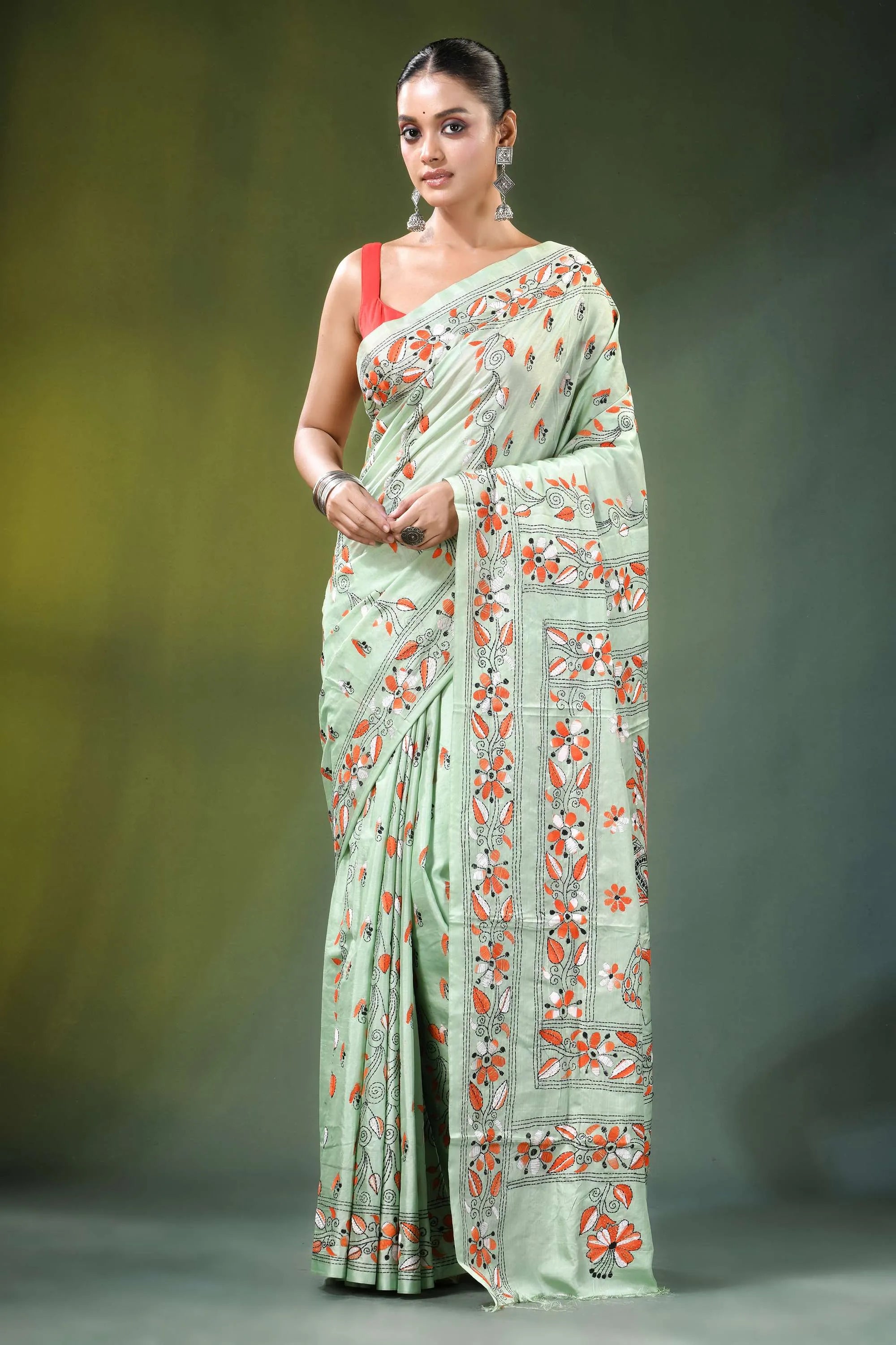 Mint green peacock motif handmade silk kantha saree light intricate orange 1