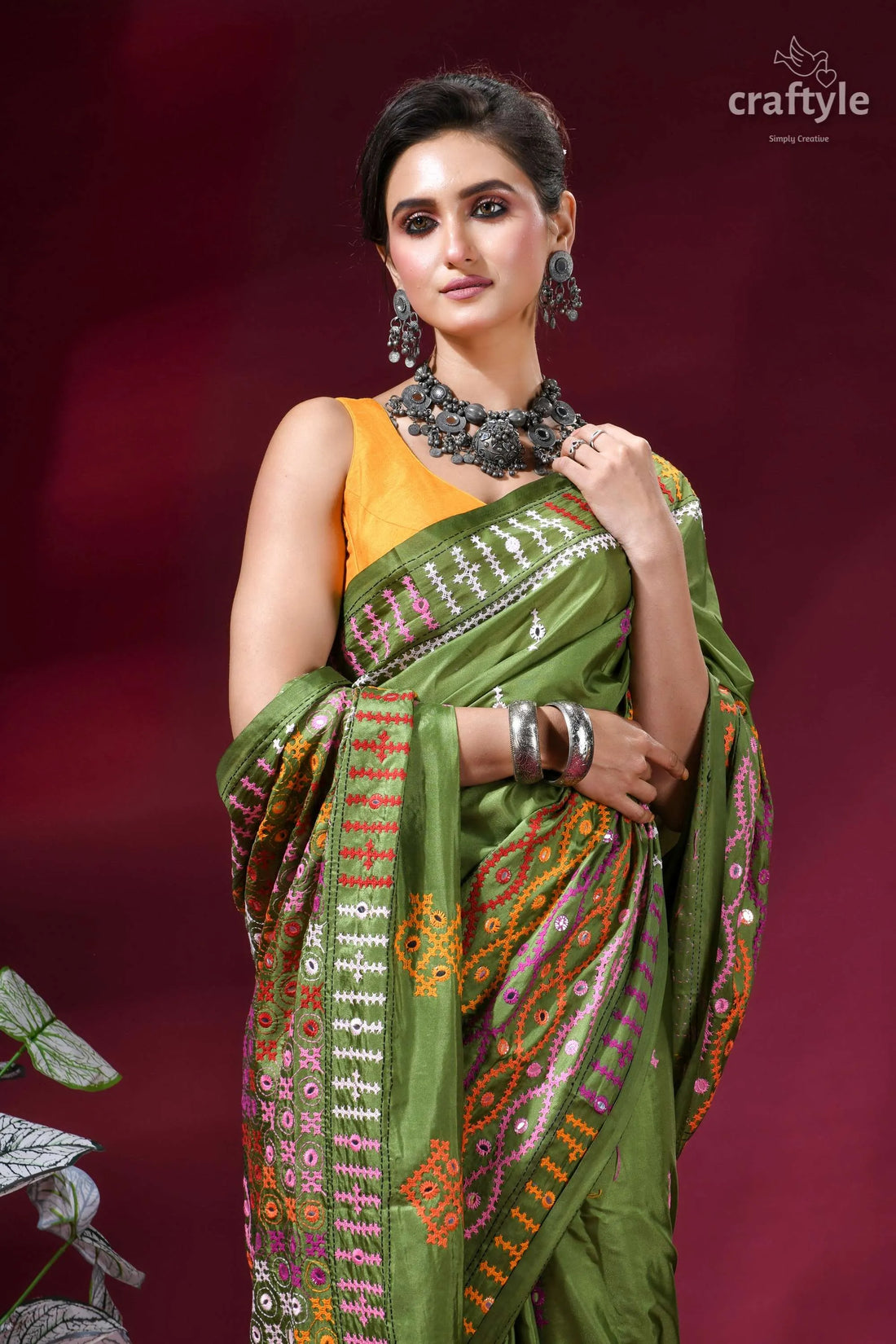 Muddy green dual-tone kutch work silk saree with mirror detailing green silk saree intricate embroidered 2