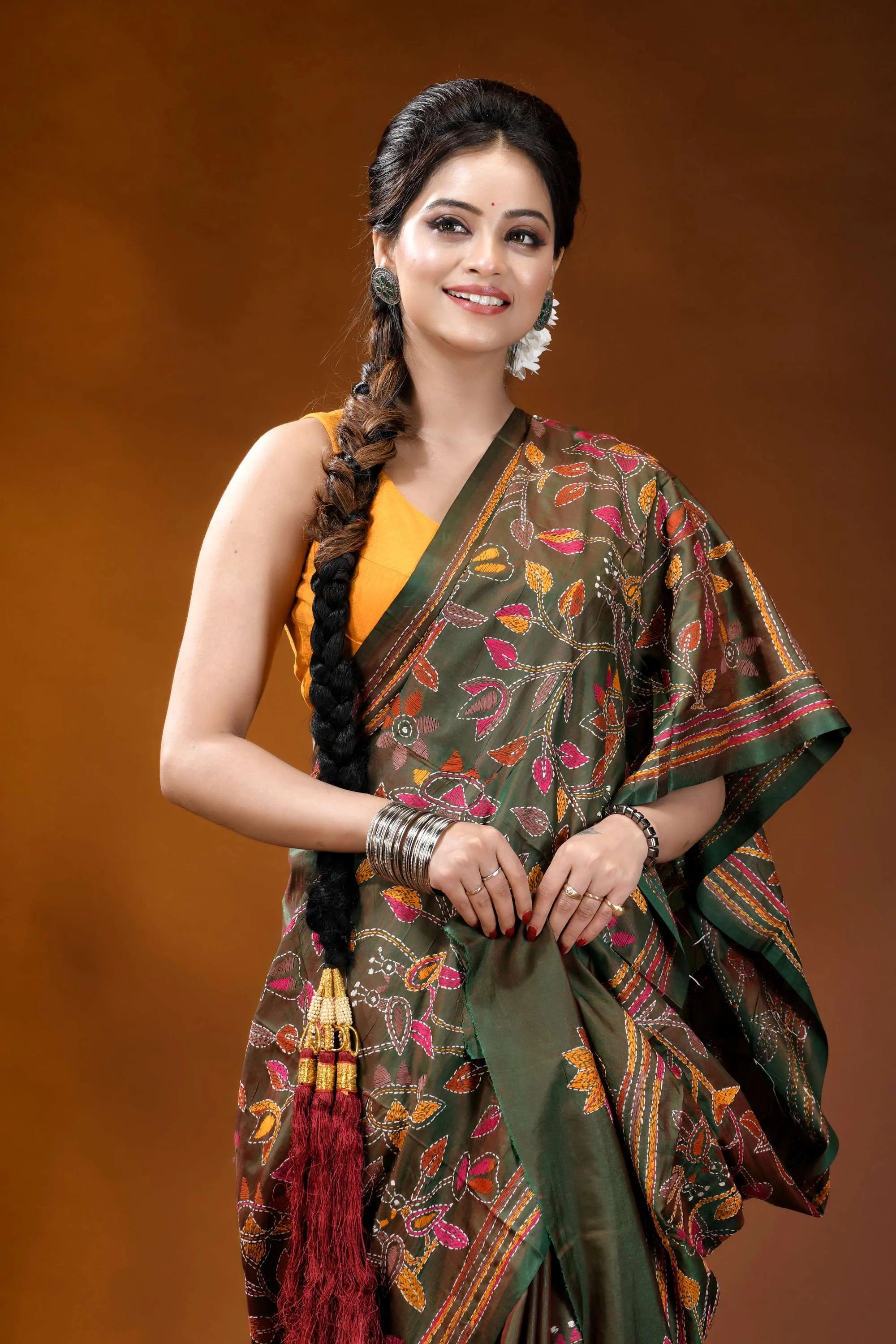 Multicolor floral design handmade jungle green silk kantha saree woman wears vibrant green silk 2