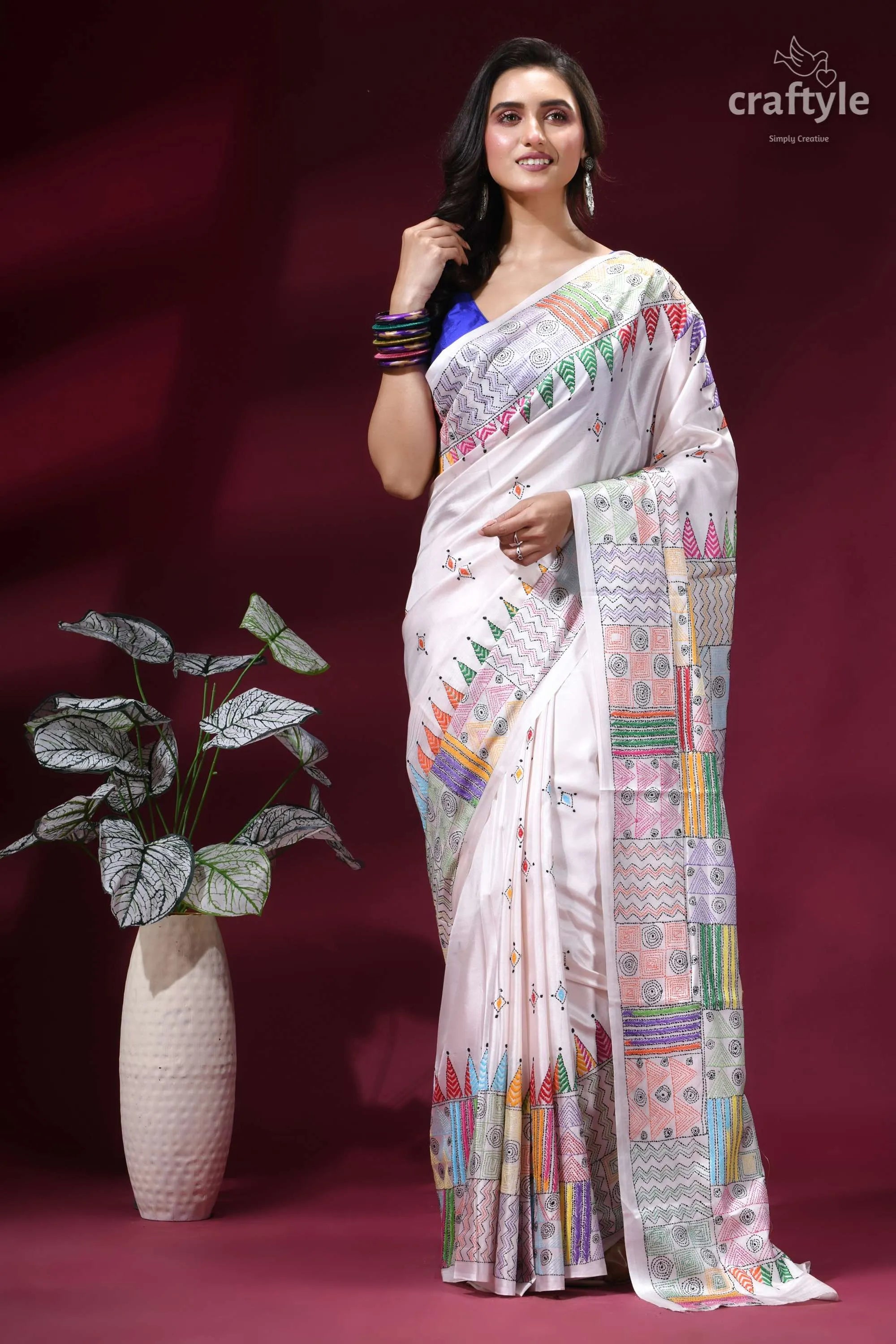 Multicolor geometric pattern silk kantha stitch saree in white woman wears white silk saree 6