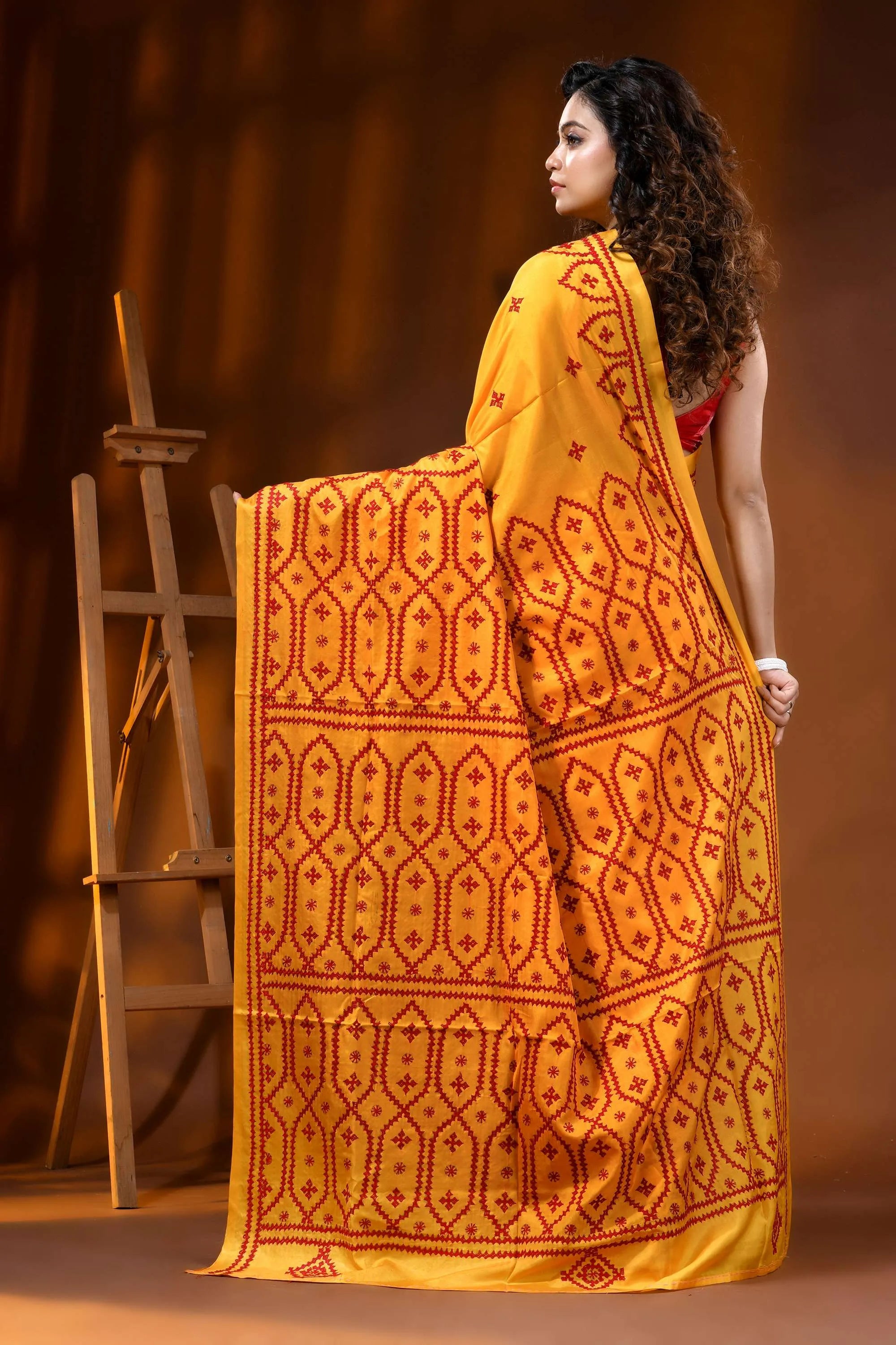Mustard yellow silk gujarati stitch saree with hand embroidered ethnic motif 5