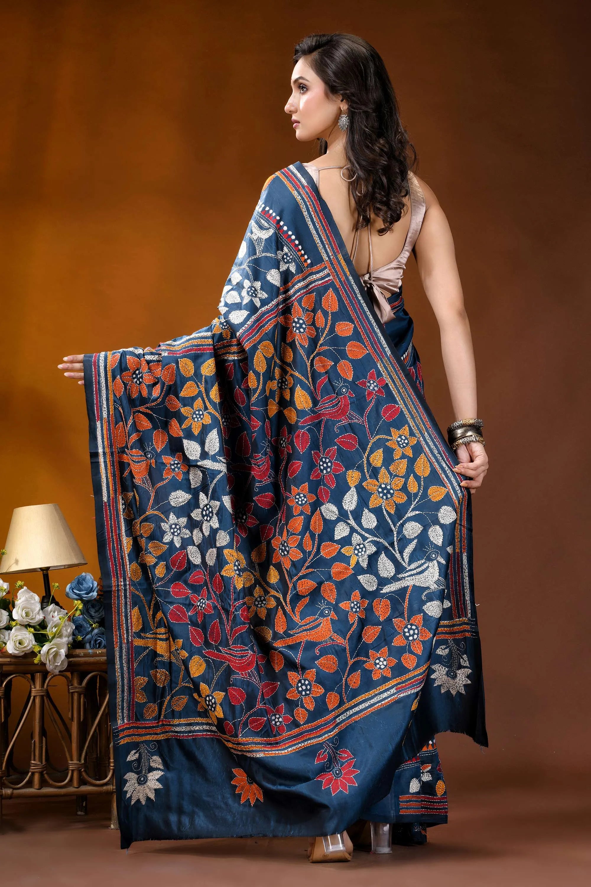 Nile blue bird theme handcrafted kantha embroidery silk saree woman wears navy blue silk 5