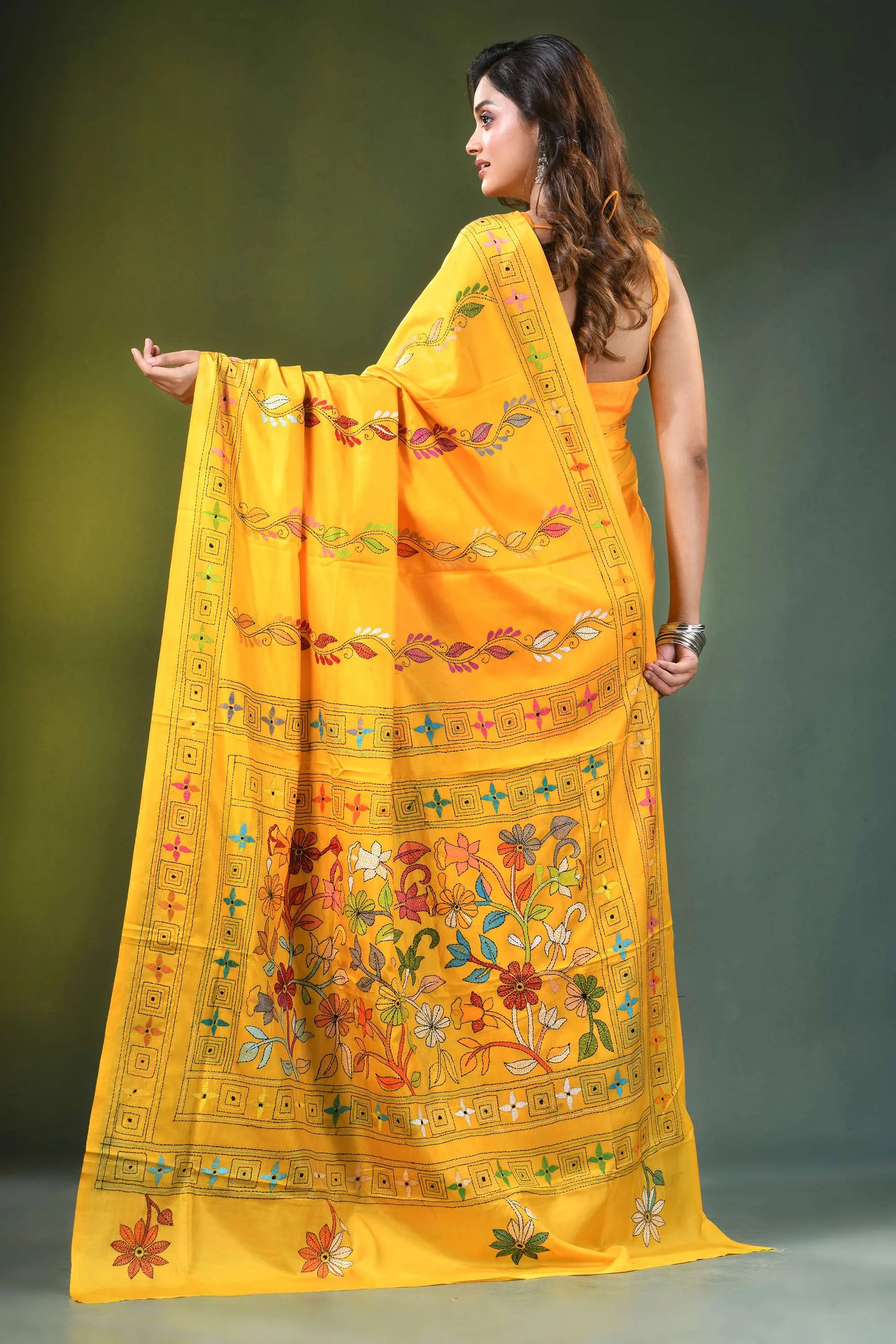 Orangey yellow handcrafted floral design kantha stitch silk saree vibrant adorned 5