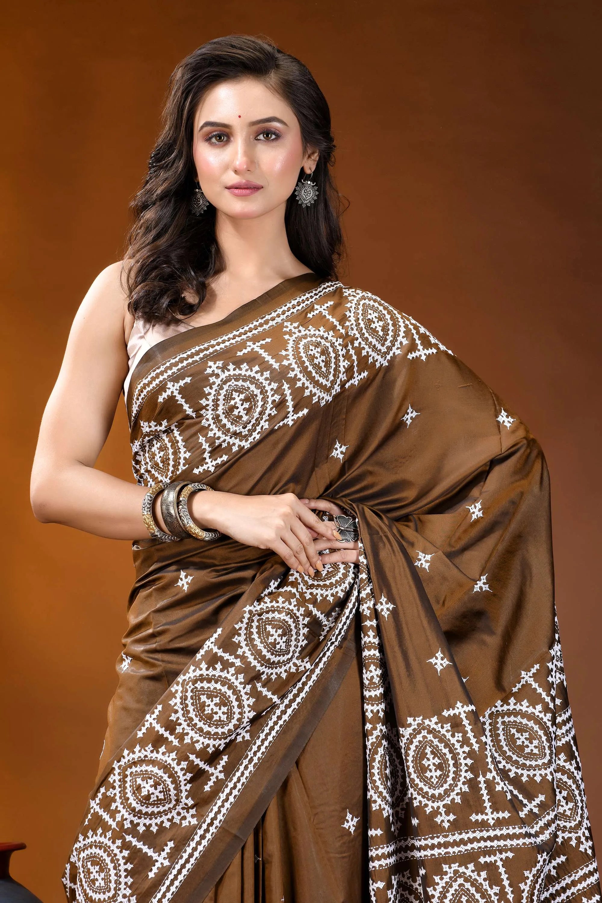 Otter brown ethnic motif handcrafted kutch embroidery silk saree brown silk saree intricate white 2