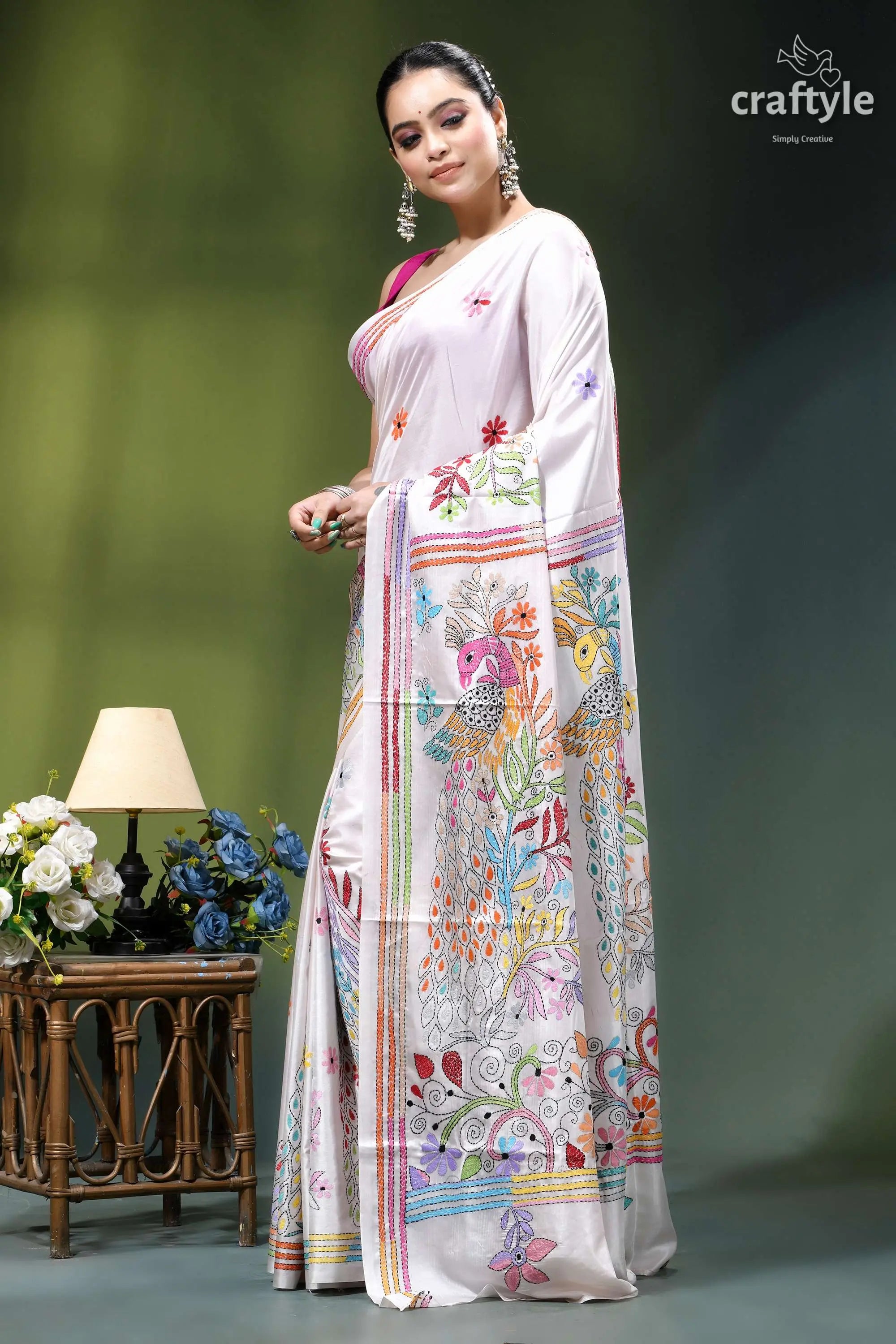 Peacock motif multicolor thread silk kantha saree in white woman wears white silk saree 2