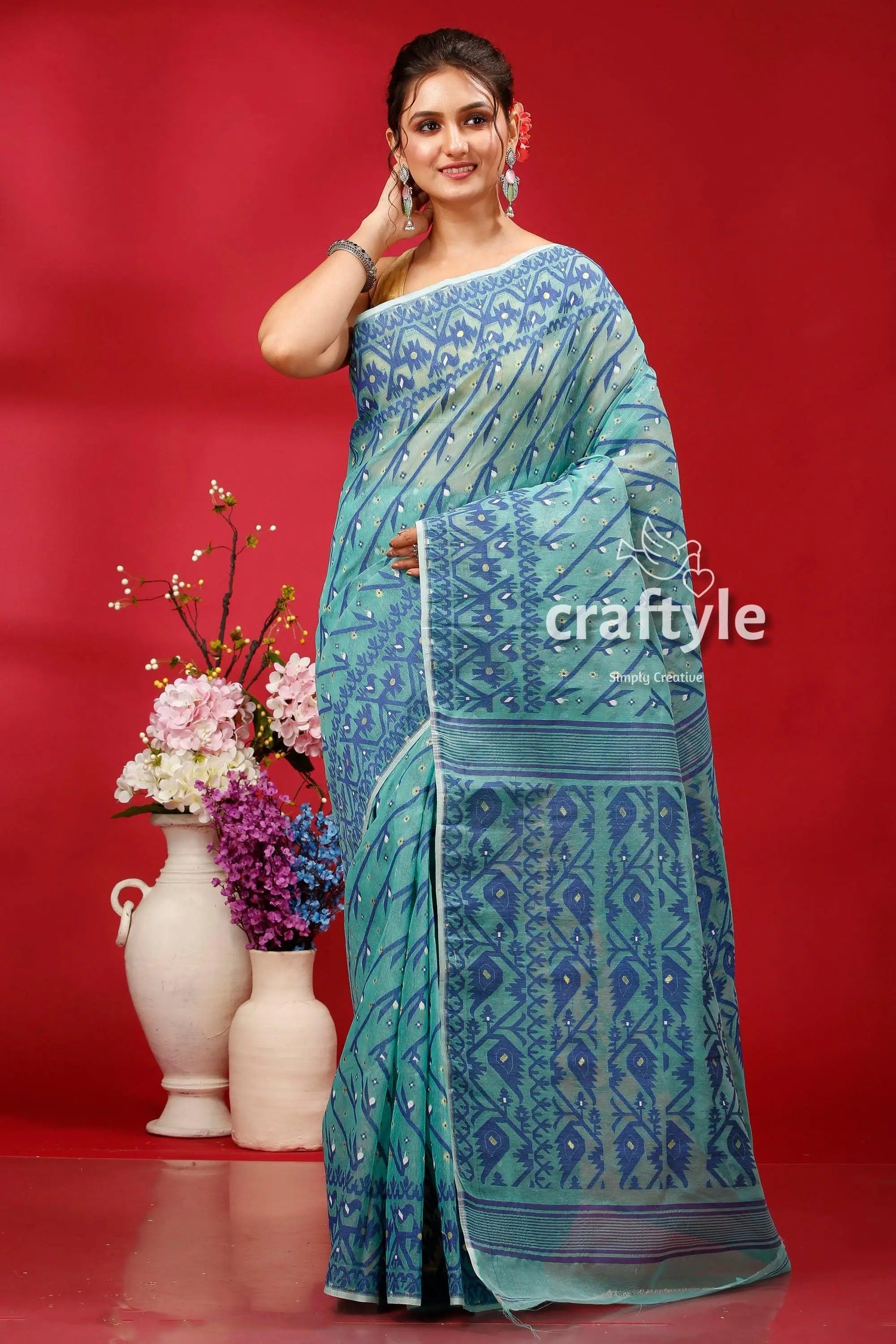 Pine green intricate jamdani saree for women blue patterned saree 1