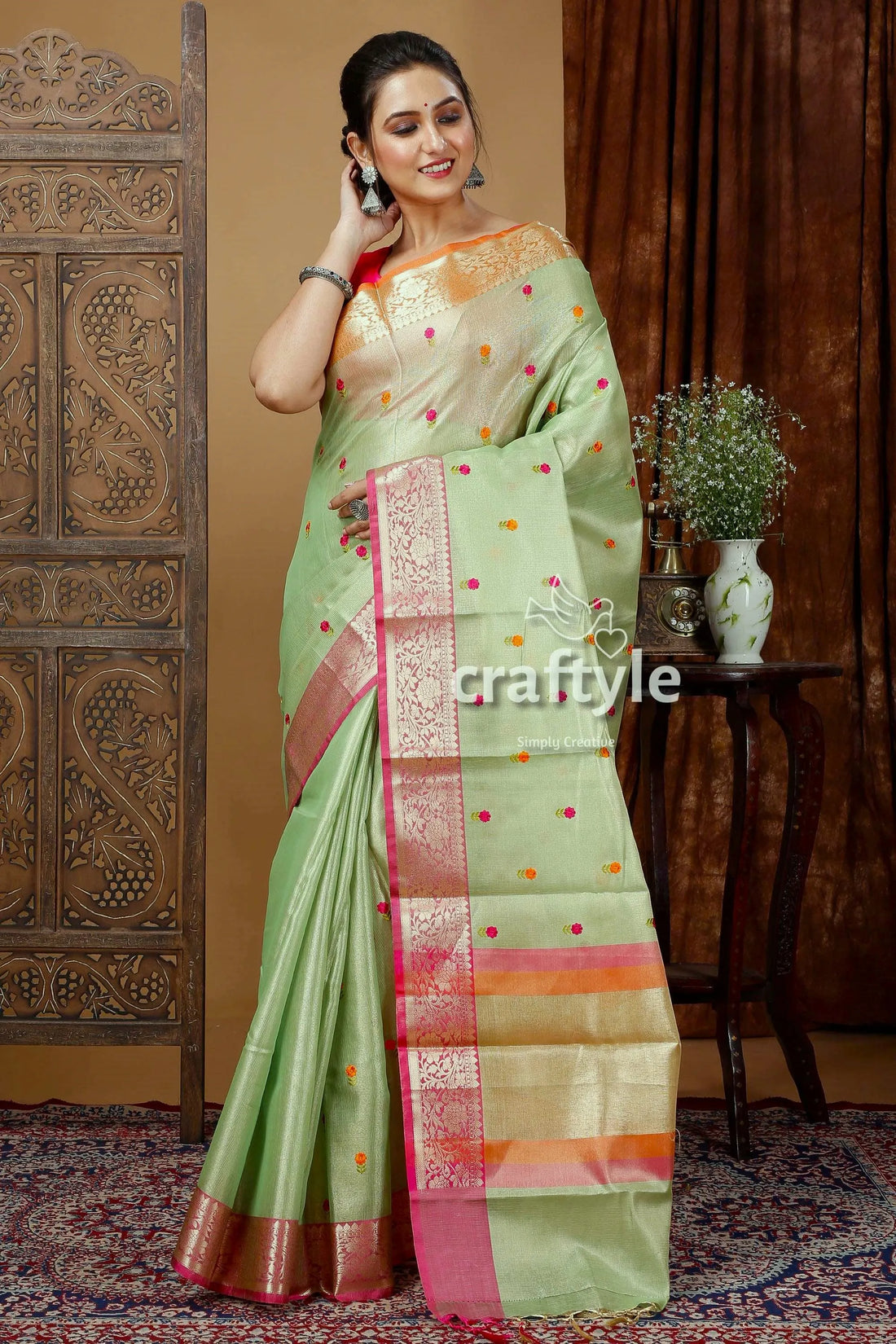 Pistachio green silk tissue organza saree - soft and elegant light pink border 1