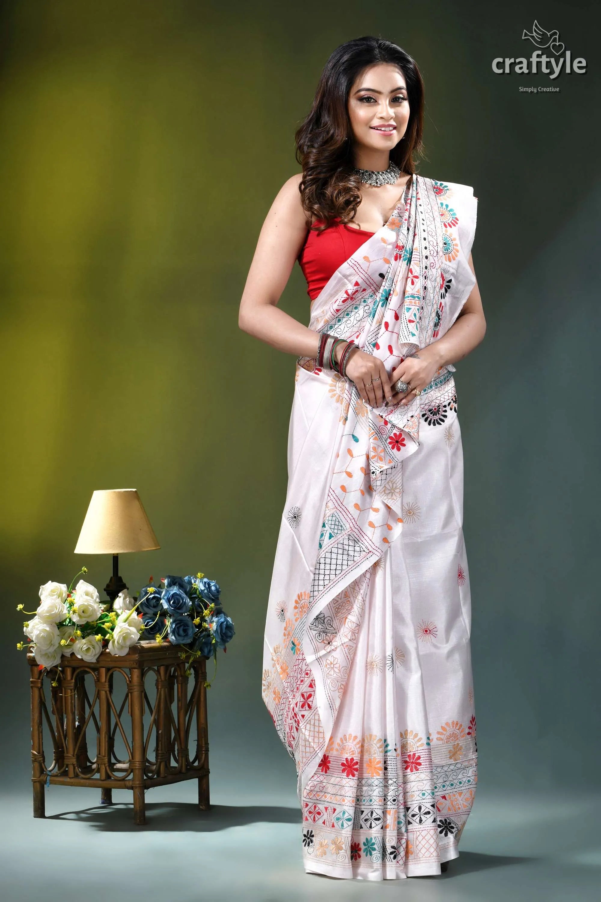 Porcelain white multi-thread floral motif hand embroidery silk lambani saree white silk saree intricate multicolored 5