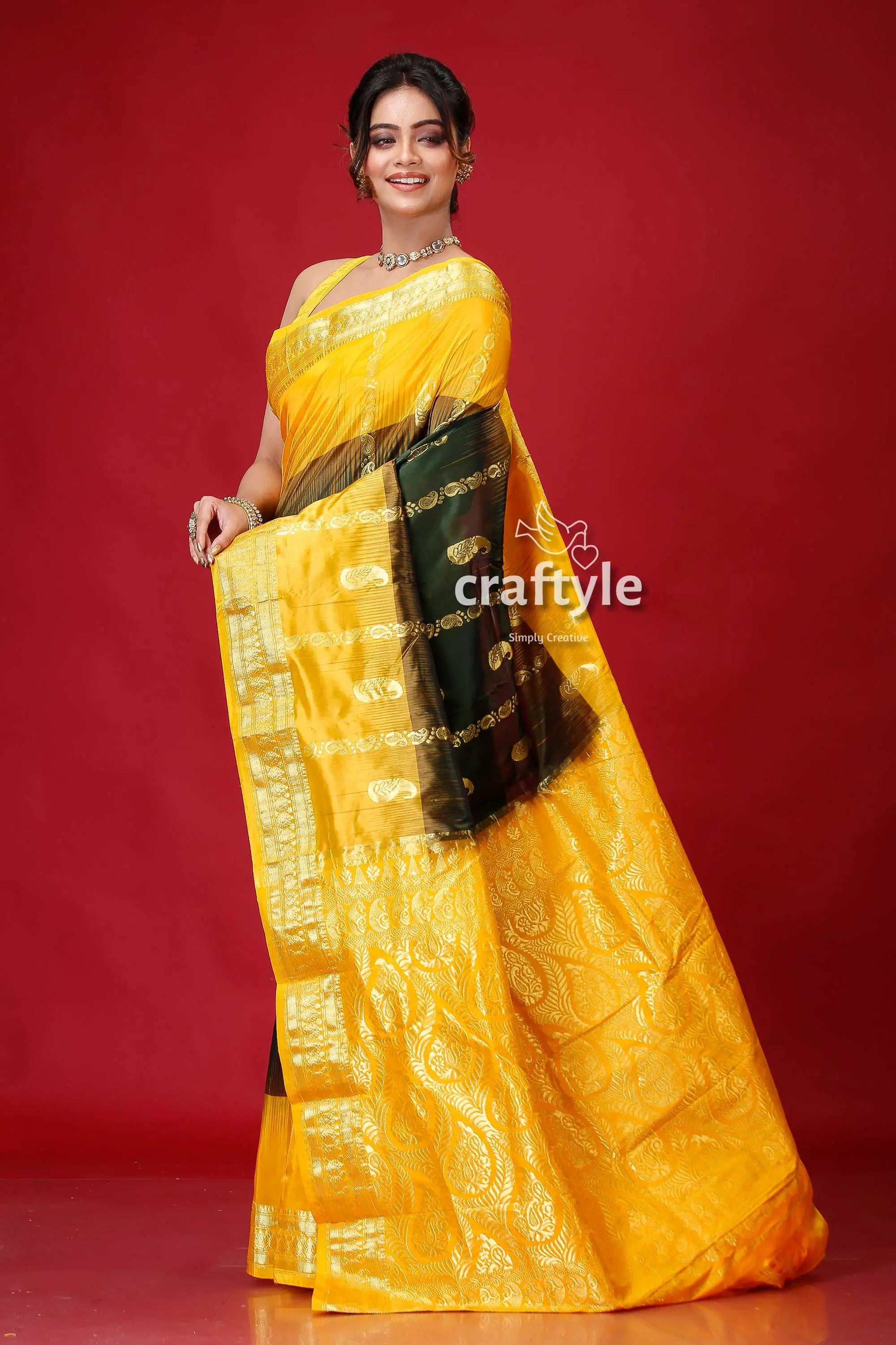 Racing green & yellow festive kanjivaram silk saree yellow black silk saree 4