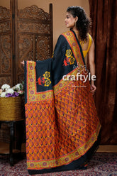 Raven black hand block design pure mulberry silk saree patterned orange black saree 4
