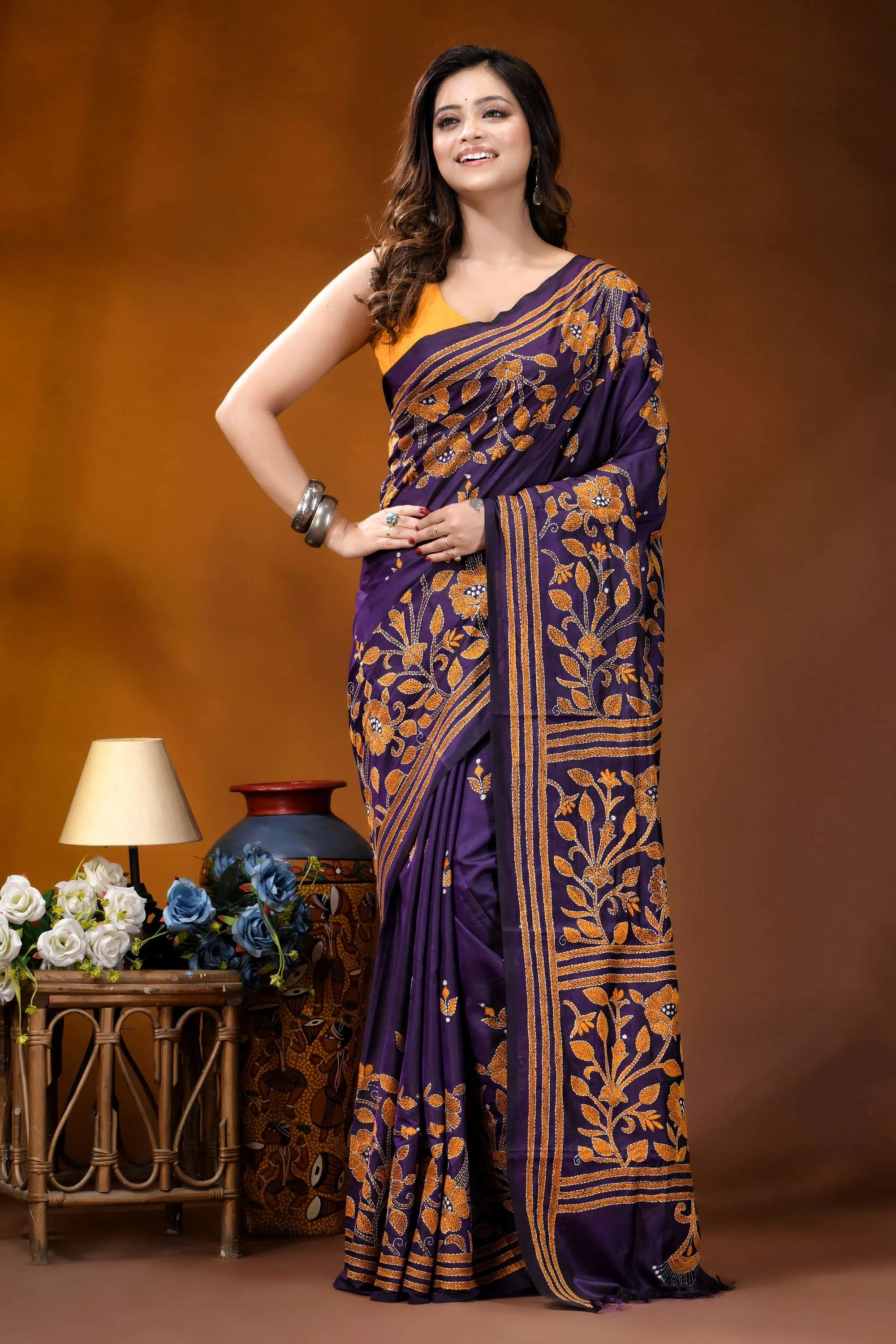 Royal purple floral design handcrafted silk kantha stitch saree woman wears deep purple saree 6