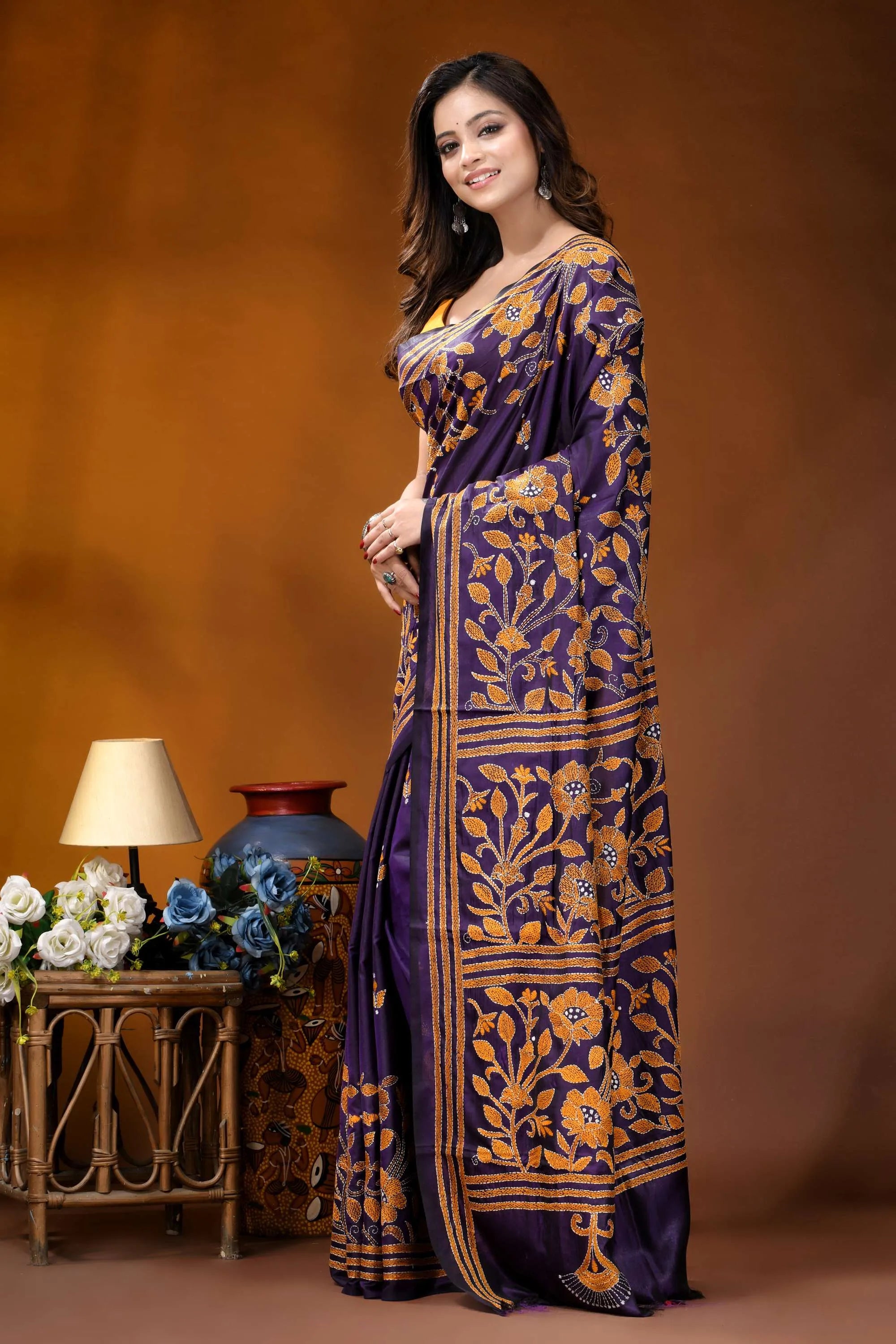 Royal purple floral design handcrafted silk kantha stitch saree woman wears deep purple saree 3