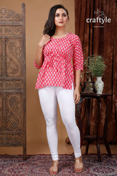 Ruby red cotton printed top with three quarter sleeves woman patterned tunic white leggings 1