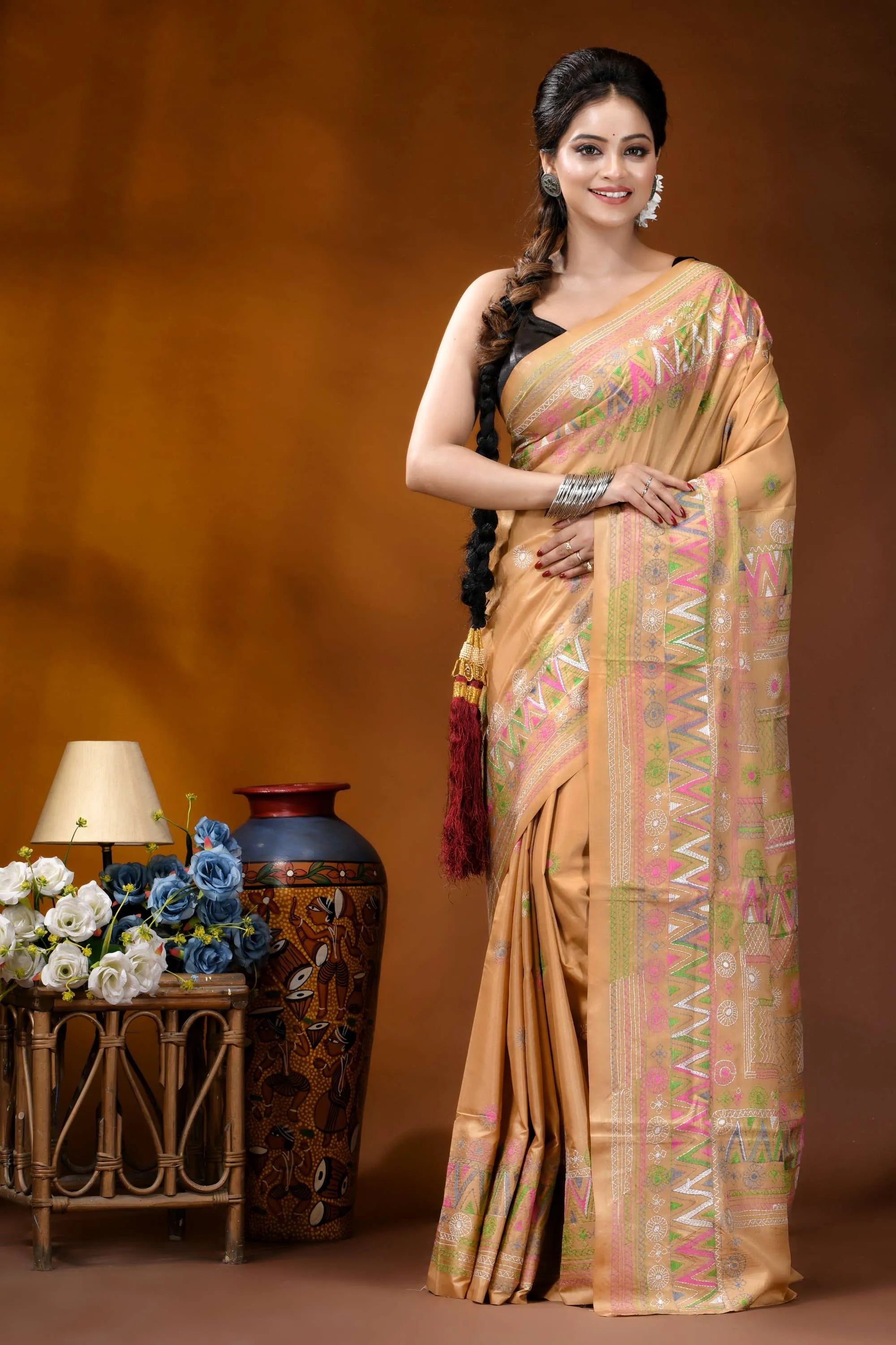 Sand beige multi-thread ethnic design handcrafted lambani silk saree woman wears peach-colored silk saree 1