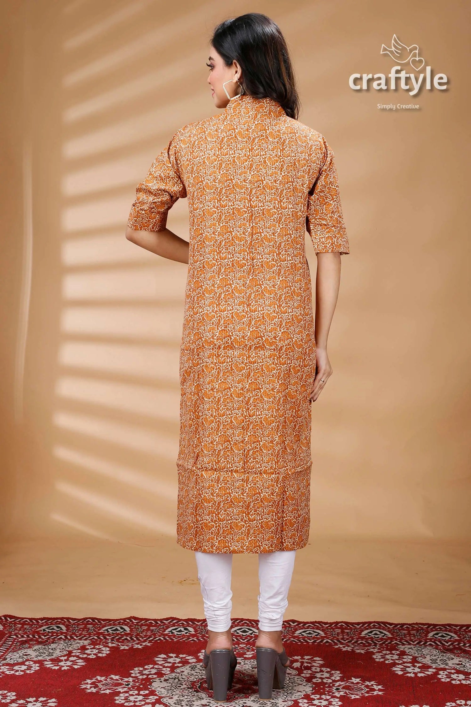 Sandy brown cotton ajrakh printed straight kurti with collar floral-patterned kurta white leggings 5