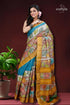 Sepia tan & blue hand painted zari border pure tussar kalamkari sari floral-patterned saree gold border 1