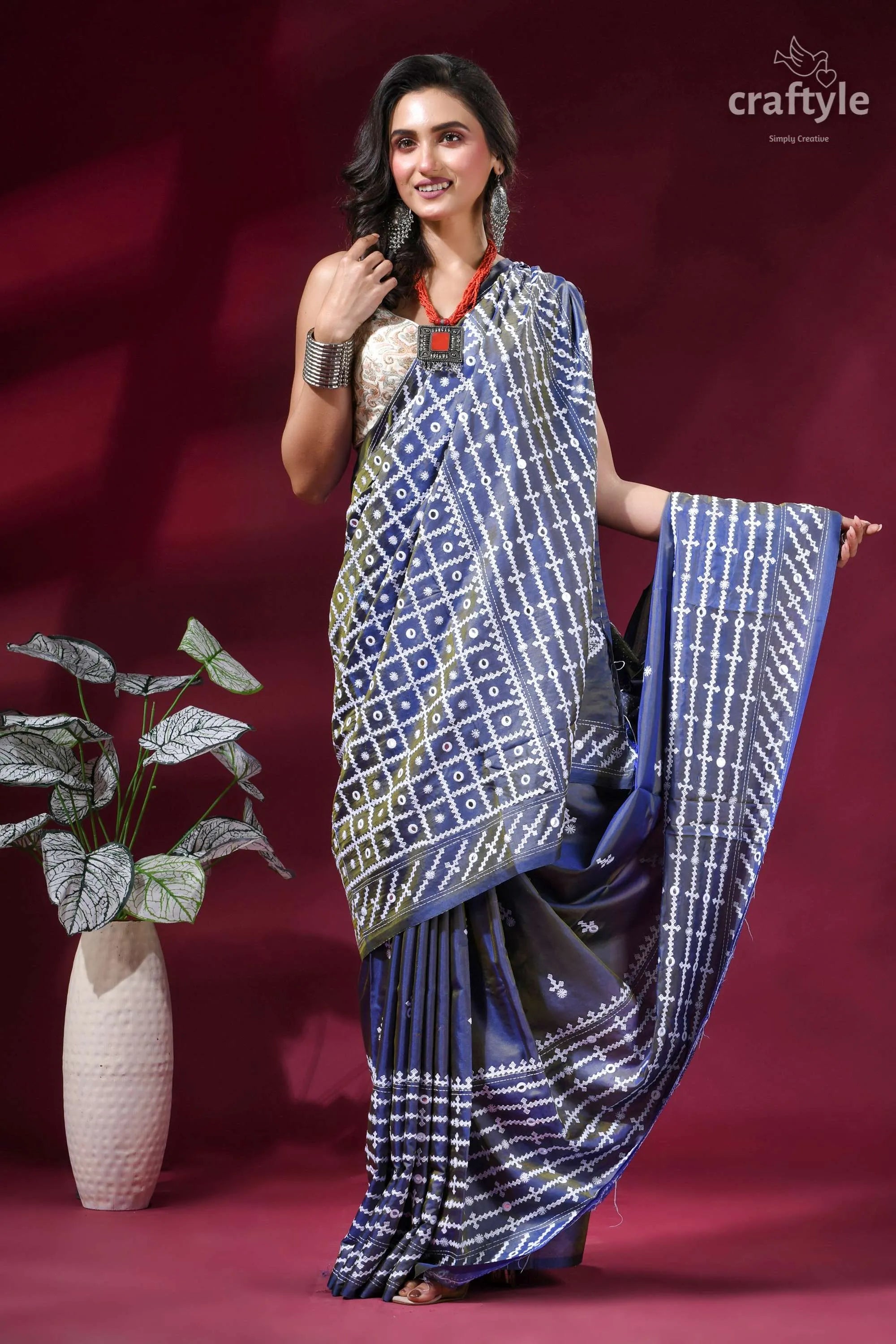 Shuttle grey handcrafted gujrati stitch silk saree - mirror work woman wears navy blue white 7