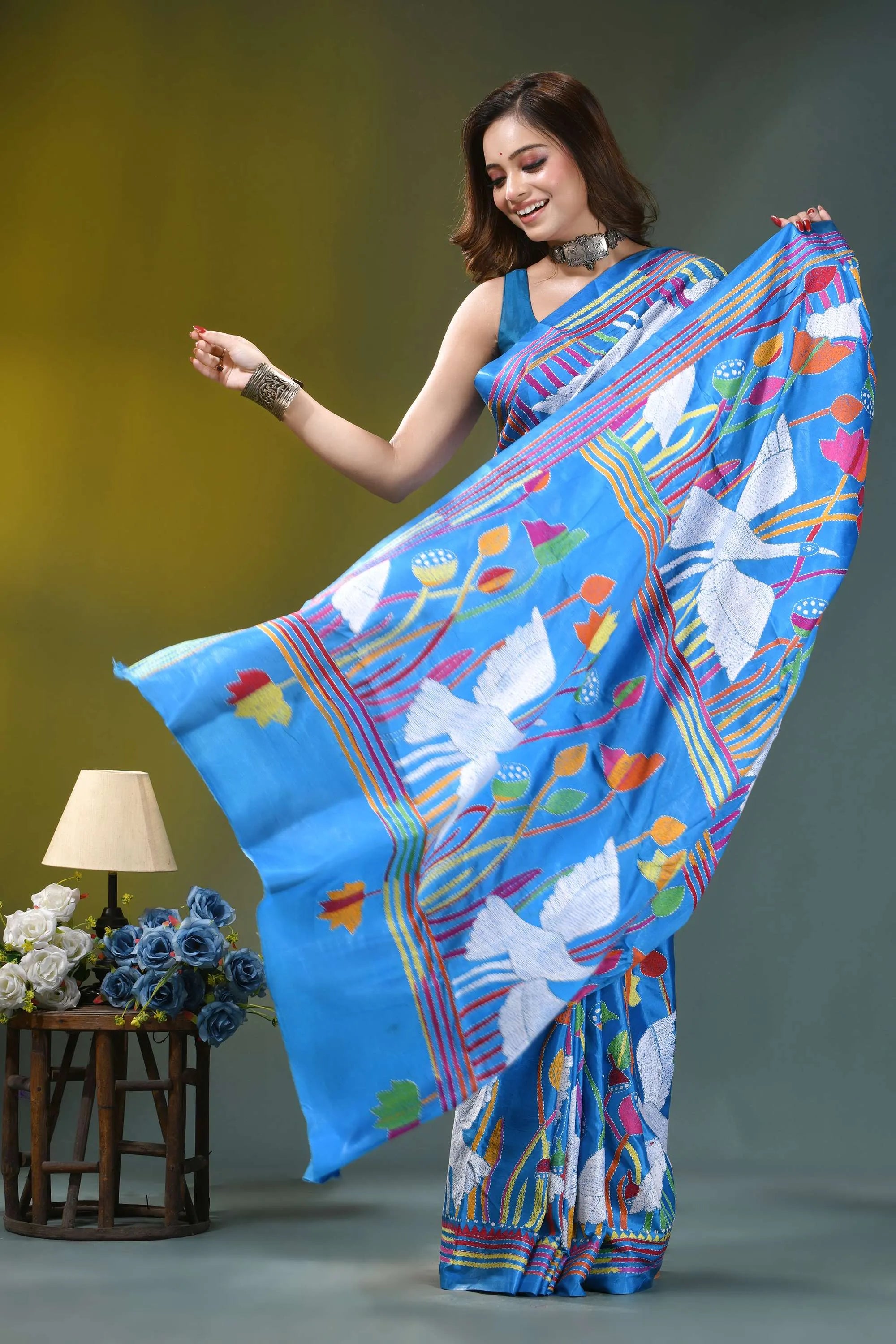 Sky blue artisanal swan motif handcrafted silk kantha saree vibrant blue saree adorned white 5