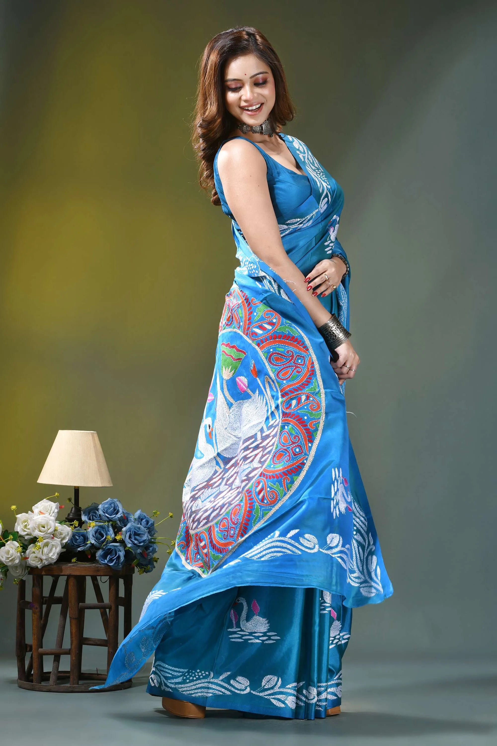 Sky blue swan motif hand embroidered silk kantha stitch saree vibrant blue saree intricate peacock 4