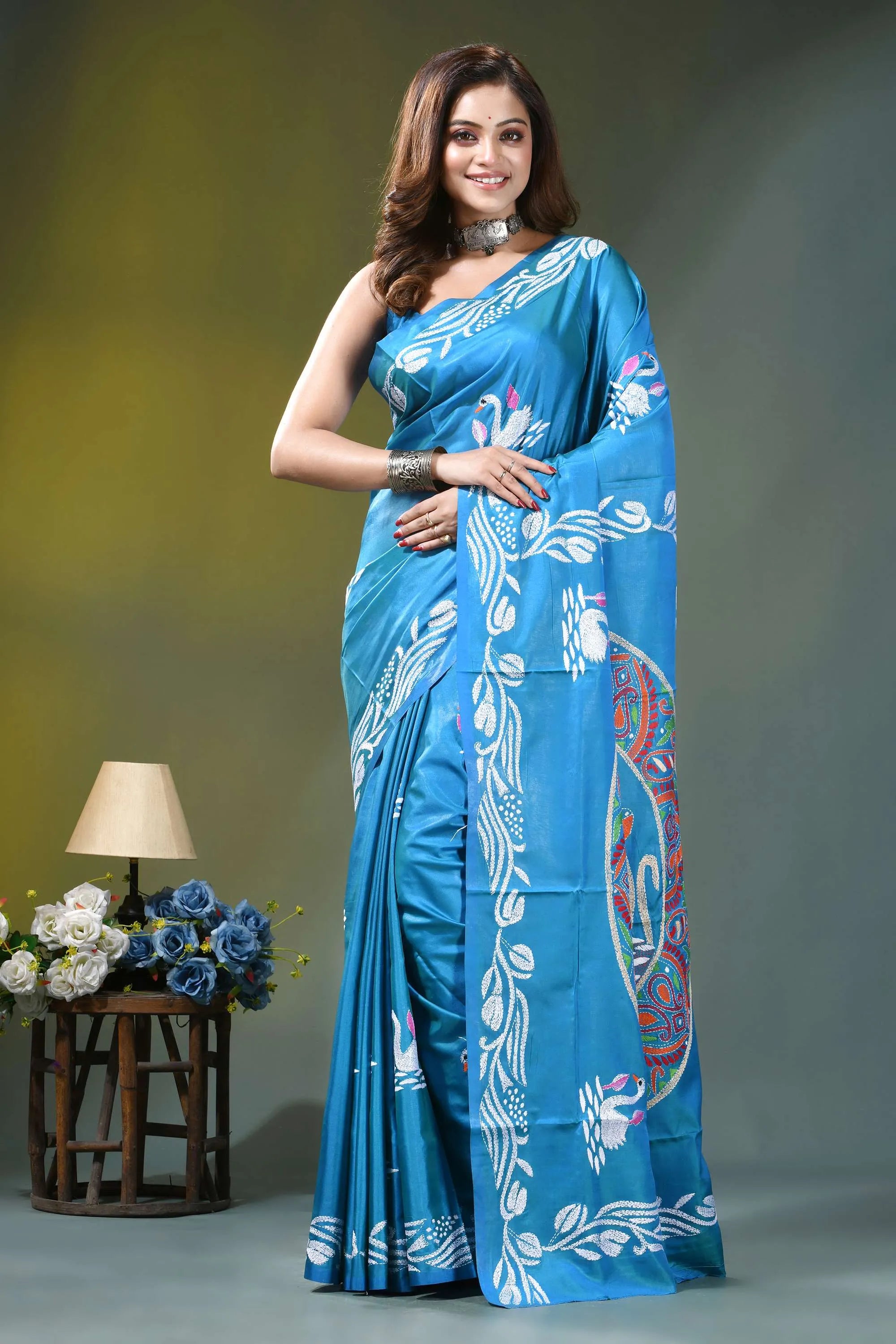 Sky blue swan motif hand embroidered silk kantha stitch saree vibrant blue silk saree adorned 1