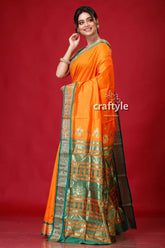 Spanish orange bomkai silk sari featuring golden zari border orange saree green gold border 3
