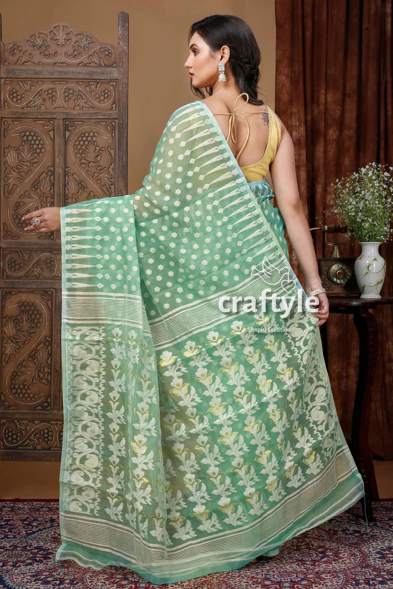 Stunning aquamarine green jamdani saree with white weave mint green floral patterned saree 4