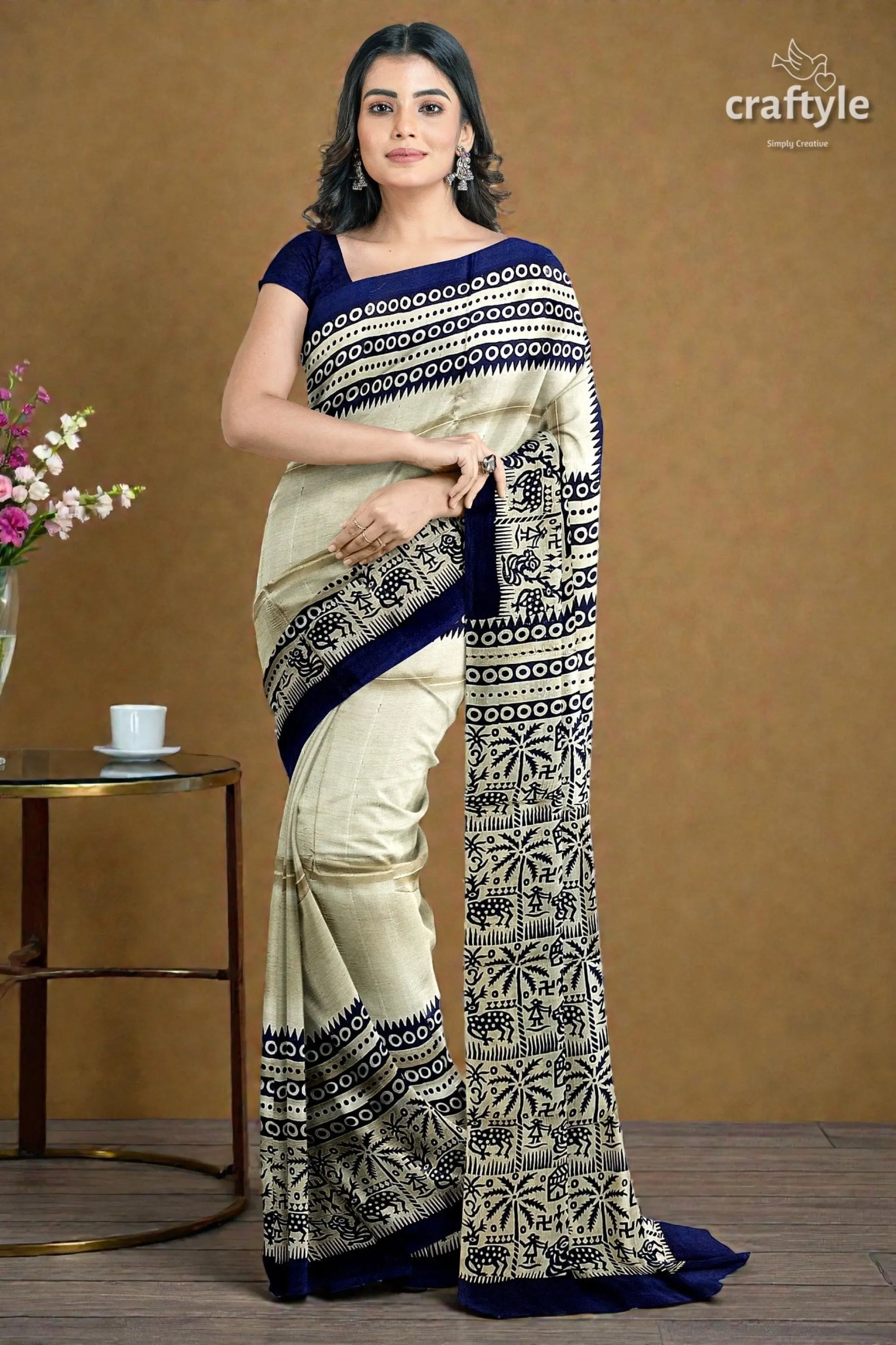 Stunning hand block print pure mulberry silk saree - black white woman wears cream navy blue 5