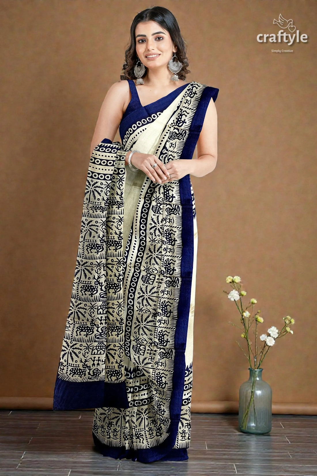 Stunning hand block print pure mulberry silk saree - black white woman wears navy blue cream-colored 2