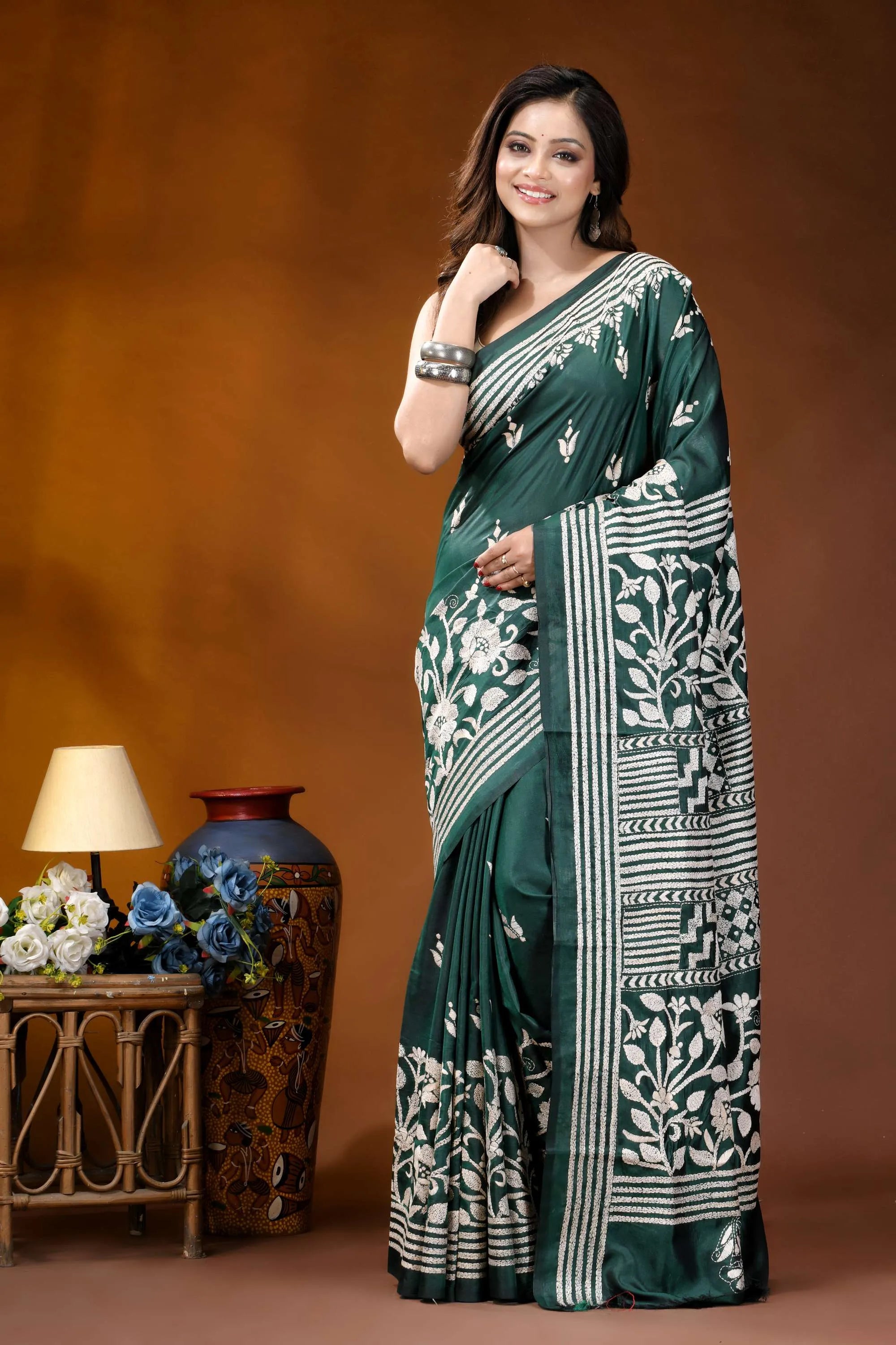 Timber green floral design handcrafted silk kantha stitch saree woman wears deep green silk 6