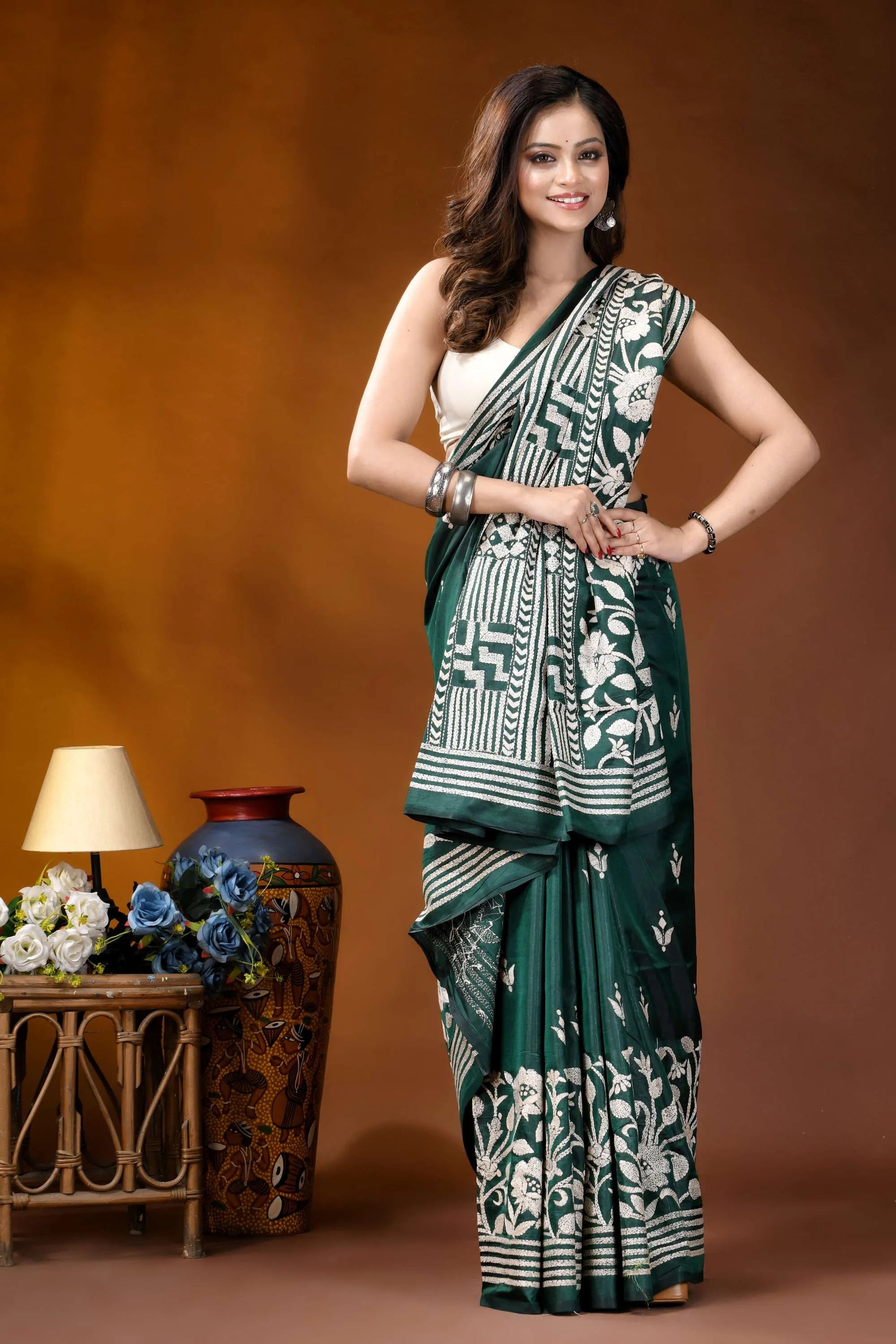 Timber green floral design handcrafted silk kantha stitch saree woman wears dark green saree 5