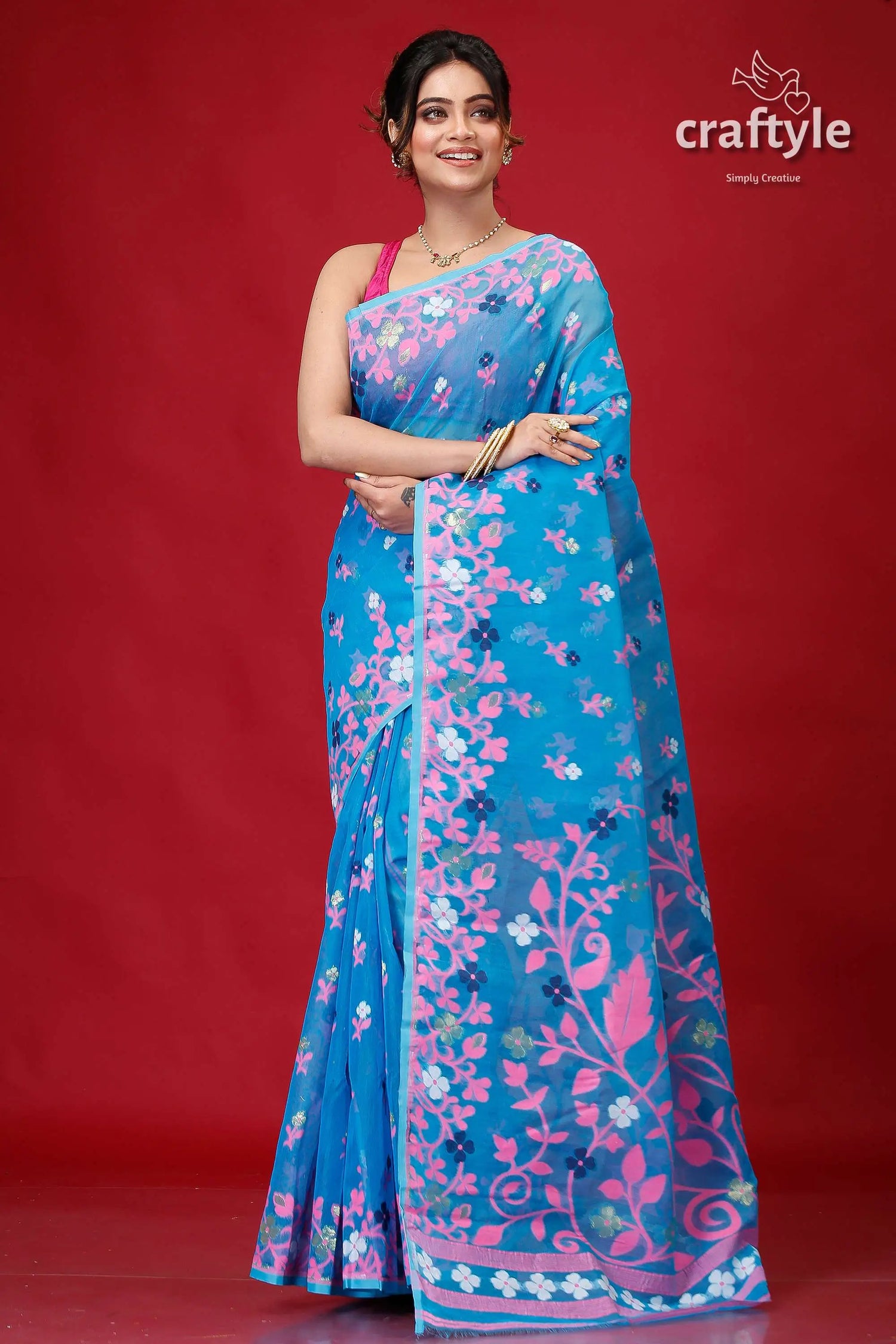 Tufts blue intricate jamdani saree blue floral saree 1