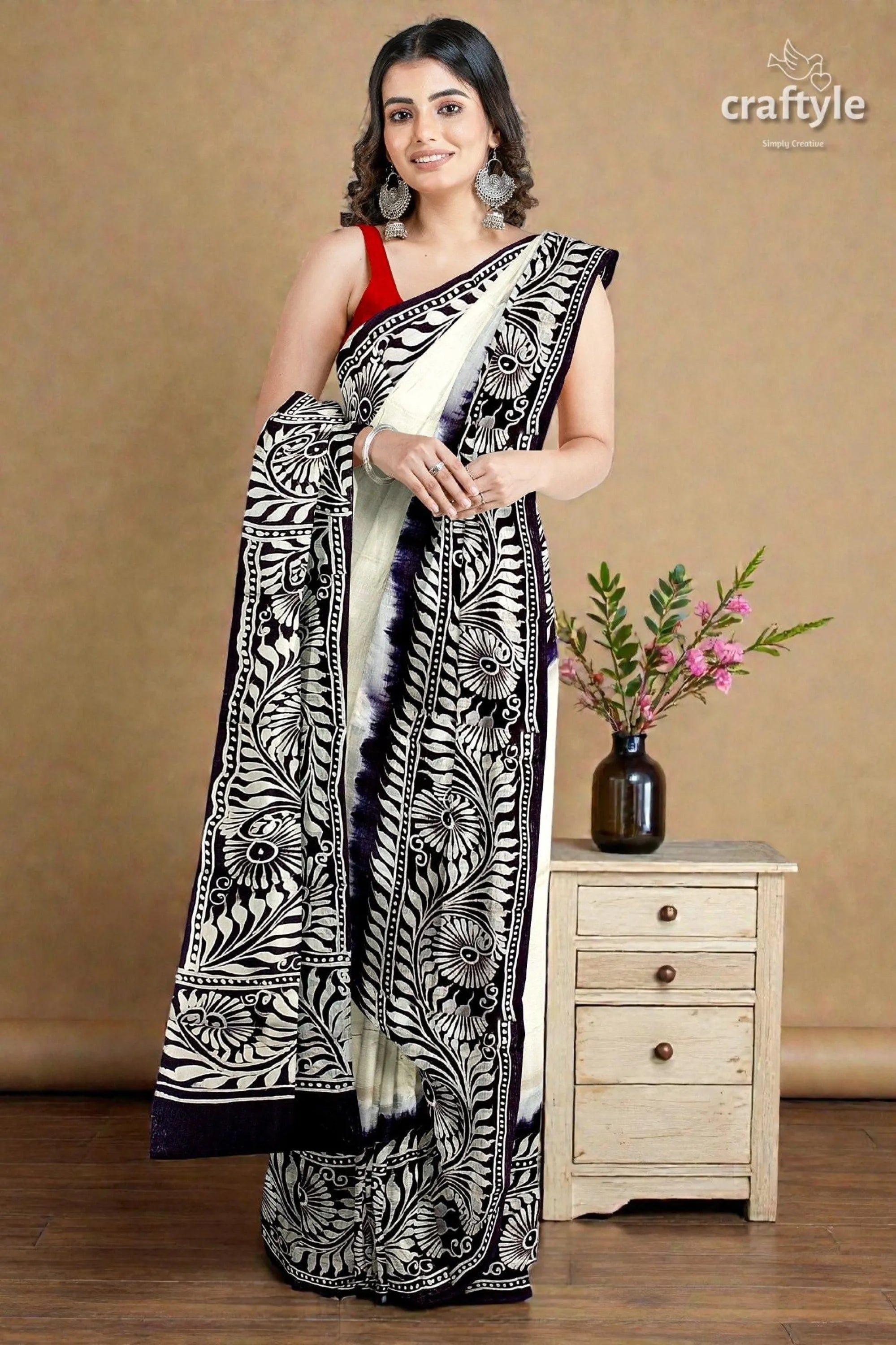 White and black soru tuli hand batik mulberry pure silk saree woman wears black white floral-patterned 1
