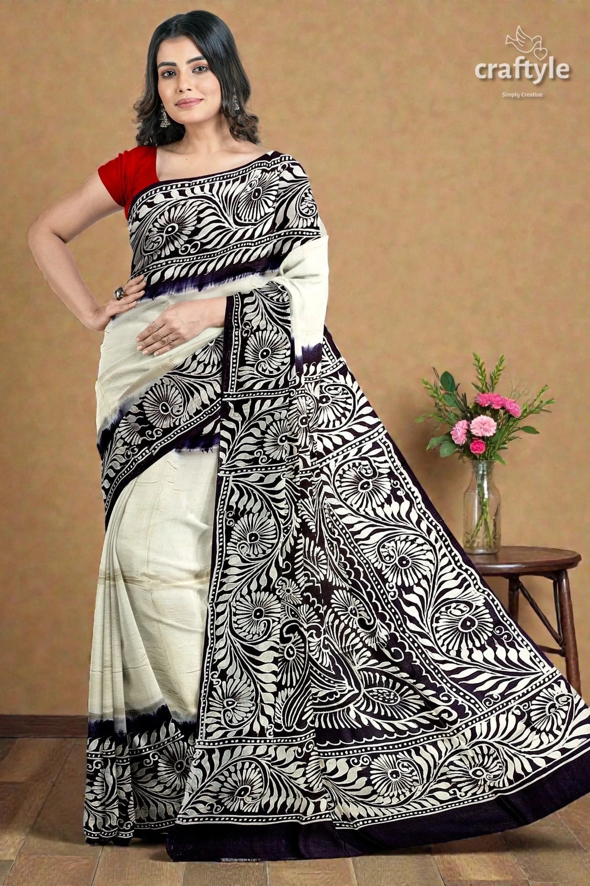 White and black soru tuli hand batik mulberry pure silk saree woman wears cream black printed 4
