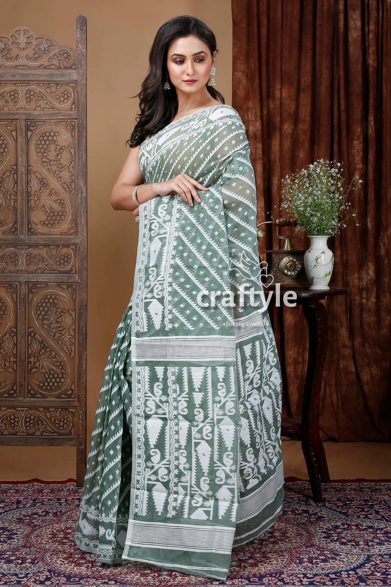 White oxley green jamdani saree - intricate design for a perfect look woman green white patterned saree 4