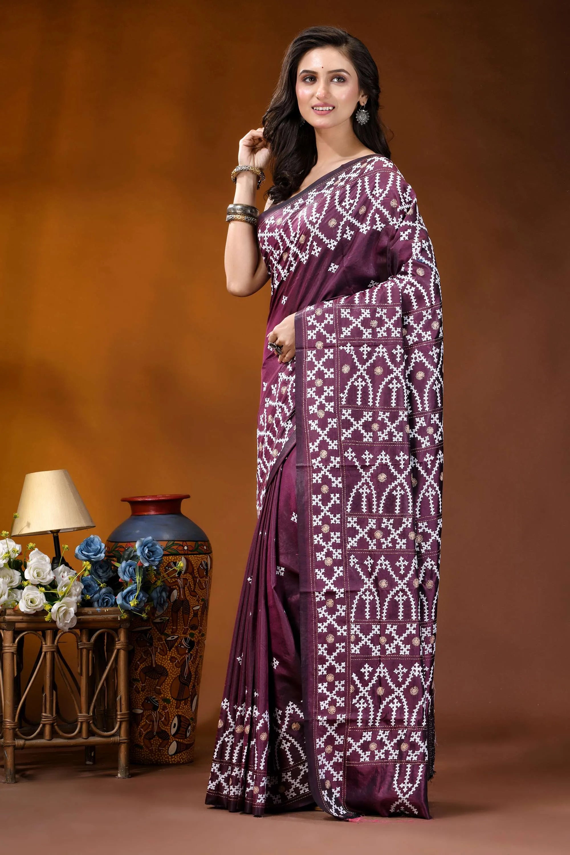 Wine ethnic motif handcrafted kutch embroidery silk saree woman wears deep purple saree 3