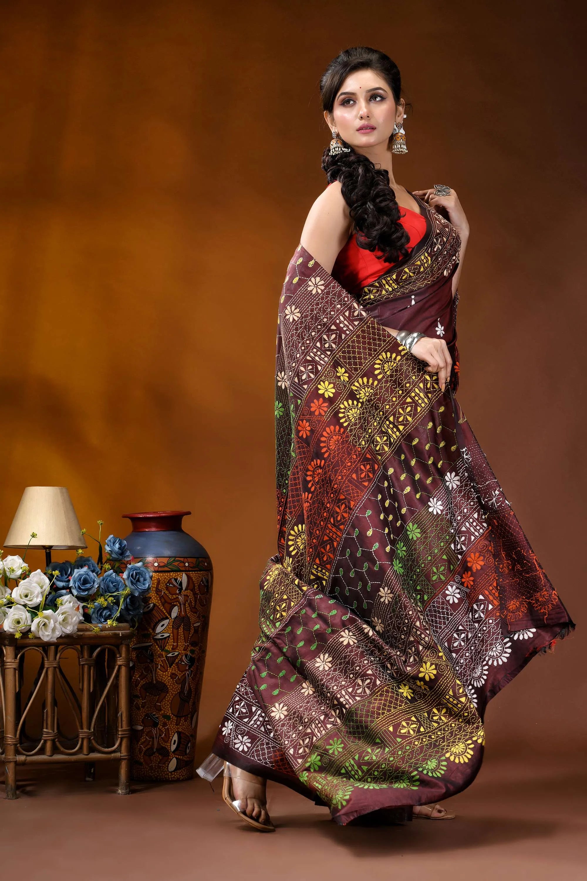 Wine multi-thread floral motif hand embroidered lambani silk saree woman wears maroon gold patterned 4