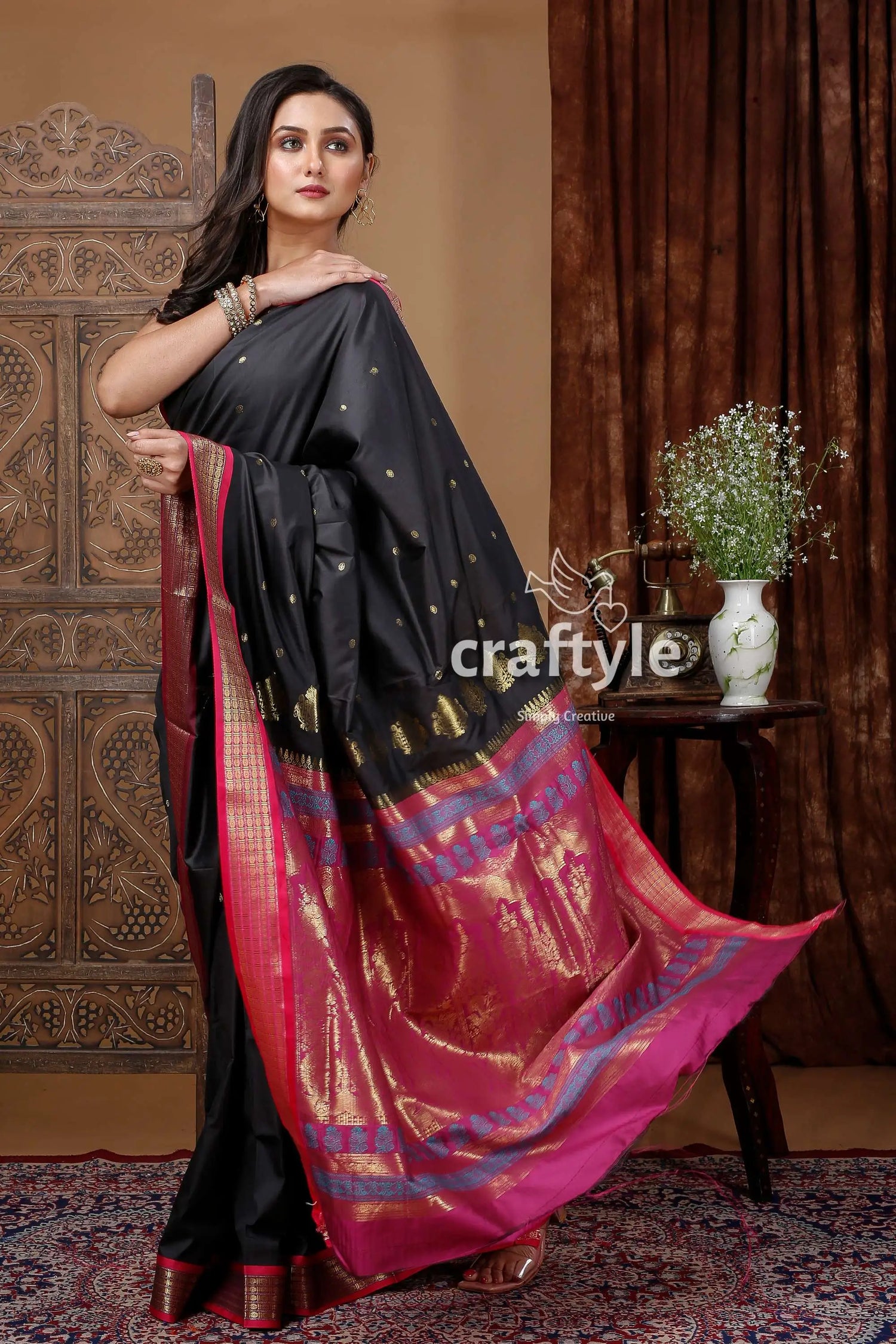Zari border bomkai silk saree with raisin black design black saree pink gold border 4