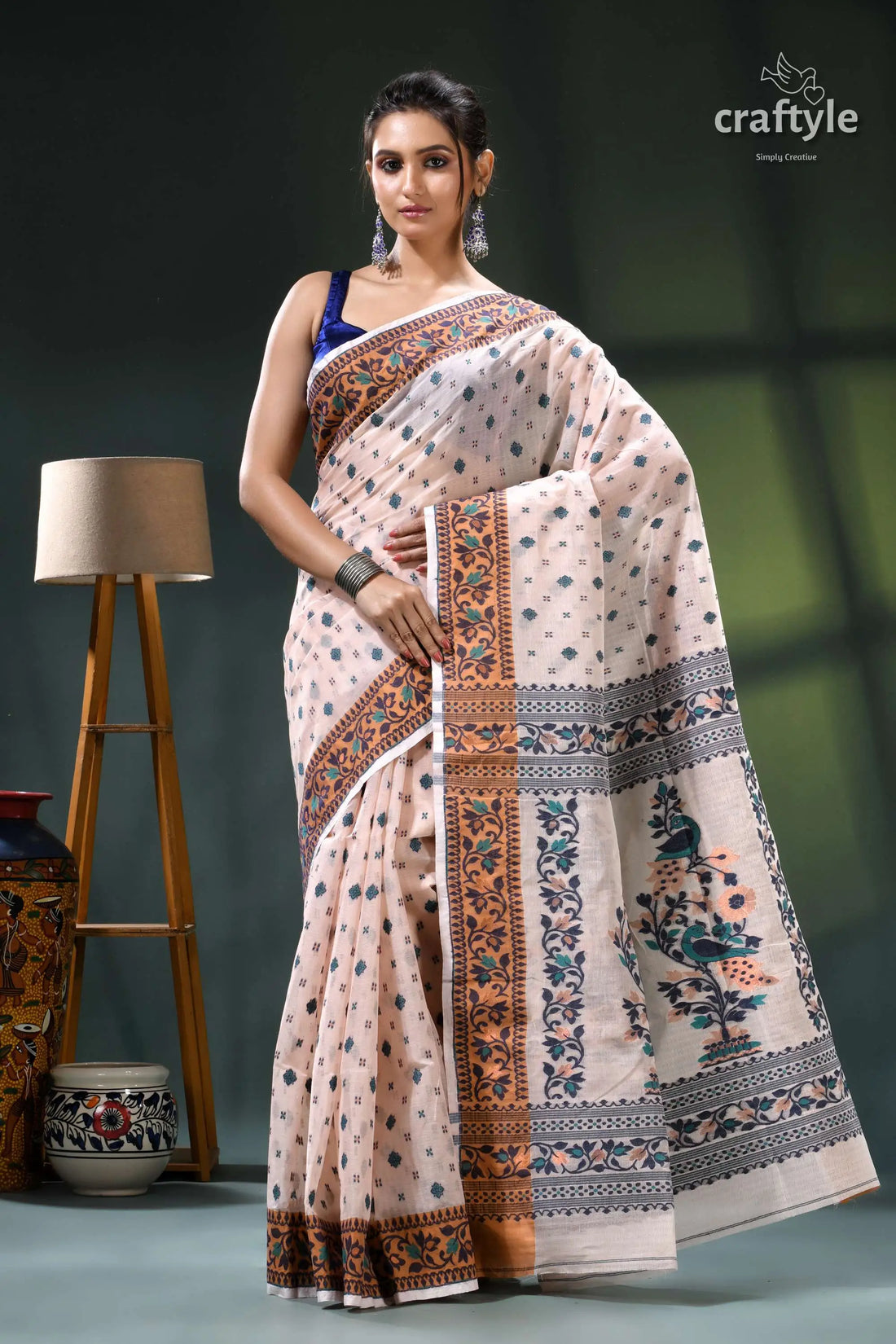 Almond white floral design graceful cotton jamdani saree cream brown floral saree intricate 1