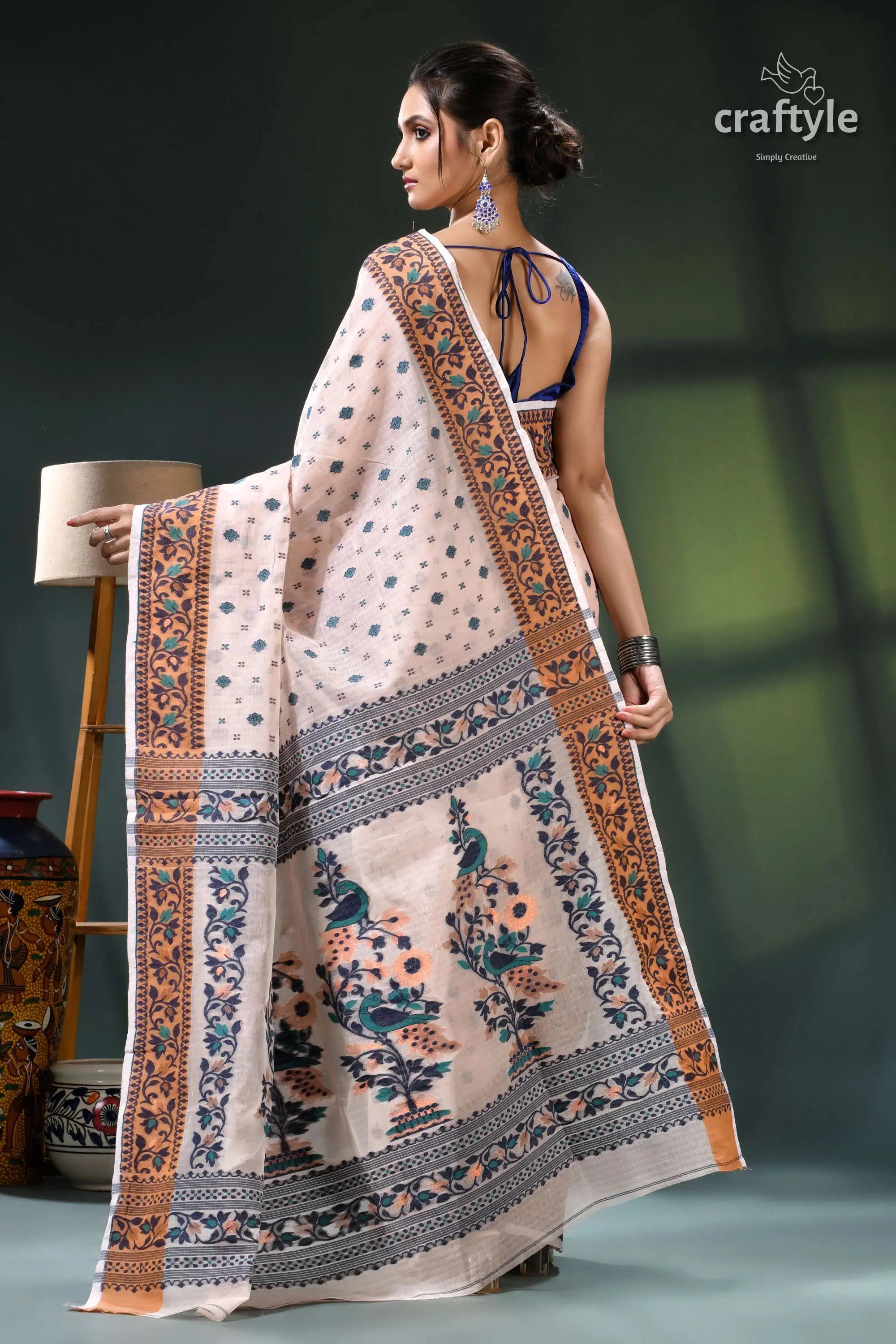 Almond white floral design graceful cotton jamdani saree cream-colored saree intricate floral geometric 5