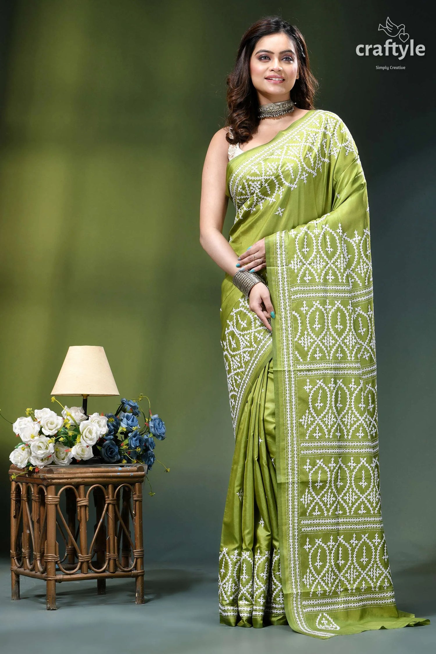 Android green hand kutch embroidery heritage silk saree woman wears vibrant lime green 1