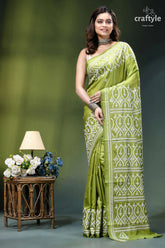 Android green hand kutch embroidery heritage silk saree woman wears vibrant lime green 1