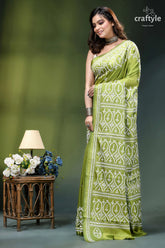 Android green hand kutch embroidery heritage silk saree woman wears vibrant lime green 3