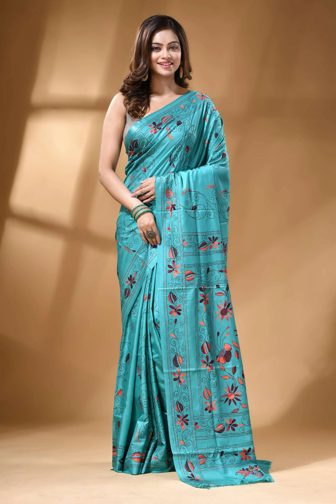 Aqua blue floral motif hand embroidered silk kantha saree teal silk saree adorned intricate 1