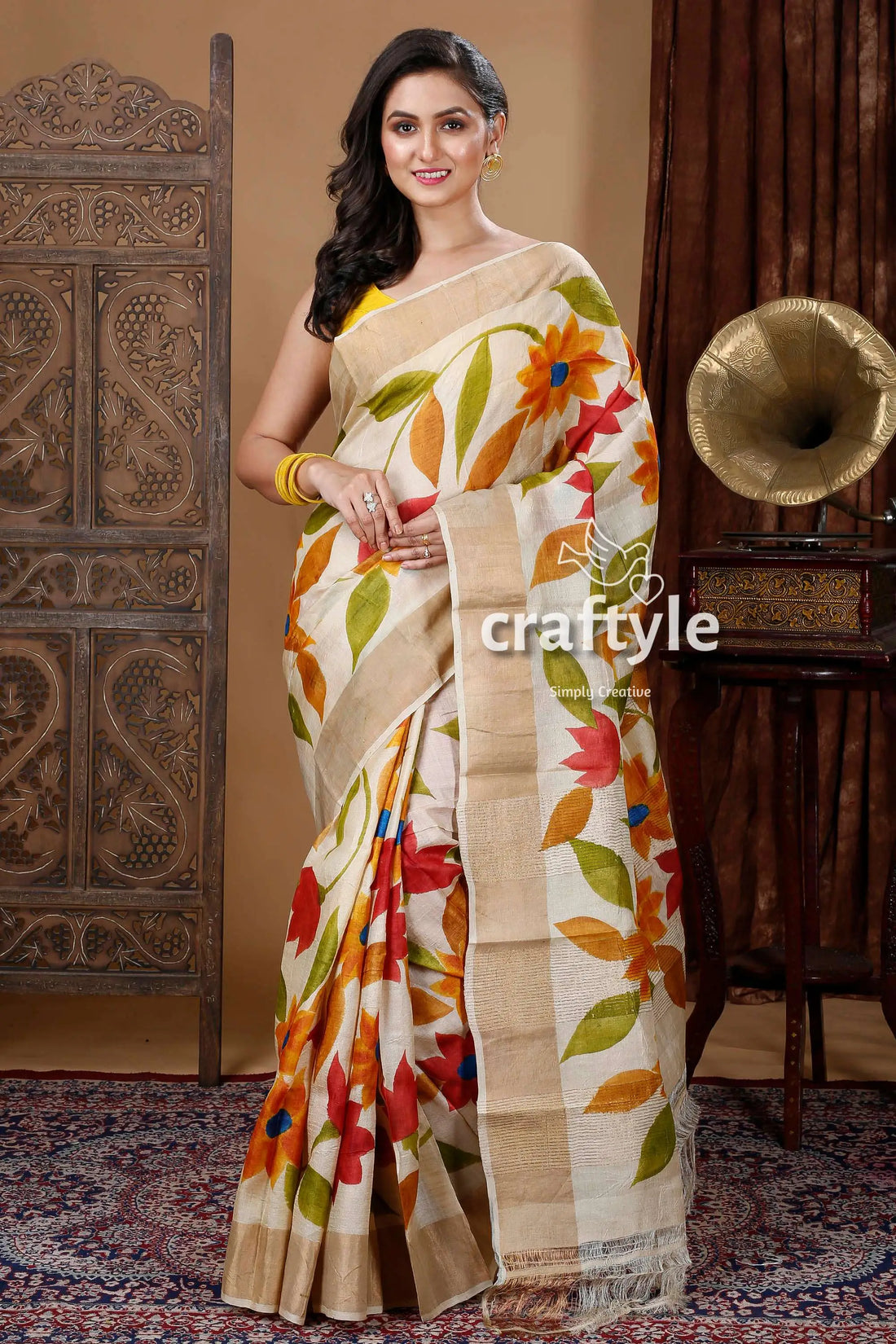 Artisanal floral motif hand painted zari border pure tussar kalamkari sari floral-patterned saree golden border 1