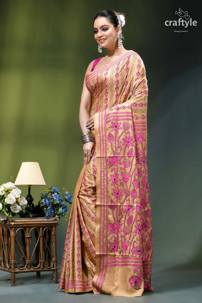Artisanal lotus design sorrel brown silk kantha stitch saree woman wears beige pink floral-patterned 3
