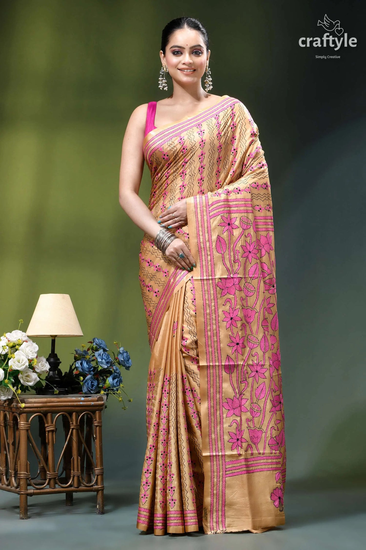 Artisanal lotus design sorrel brown silk kantha stitch saree woman wears peach-colored saree vibrant 1